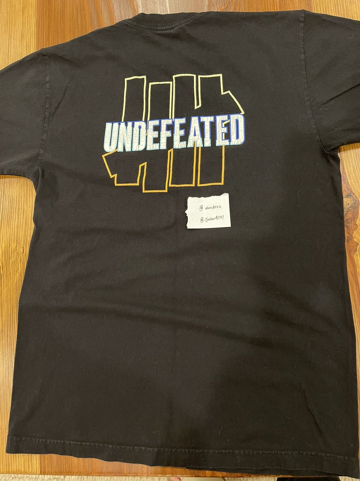 undefeated white tee
