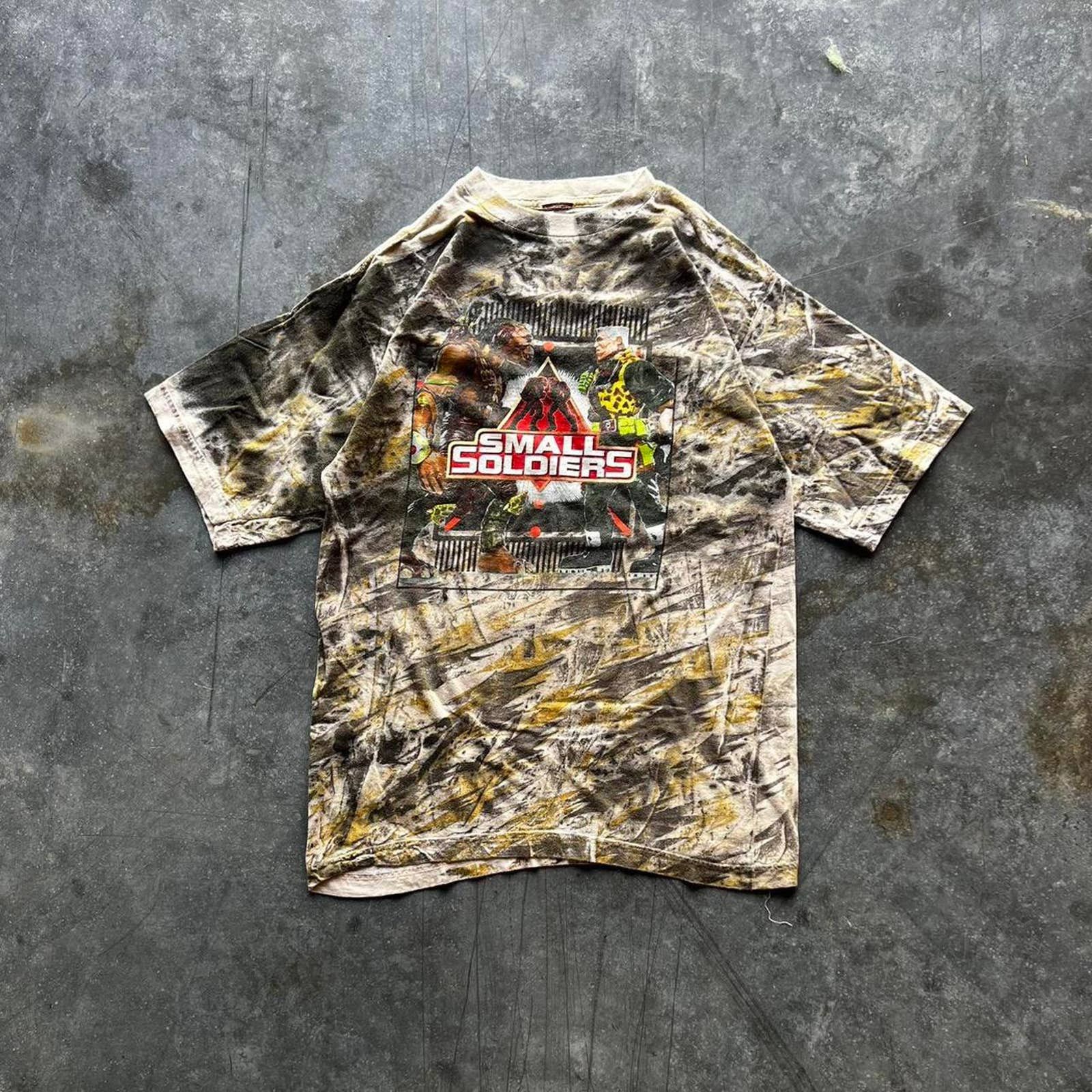 T-shirt Vintage Small Soldiers (1998) - Archer Vs Chip Hazard - Taille M - Blanc - Neuf Avec étiquette