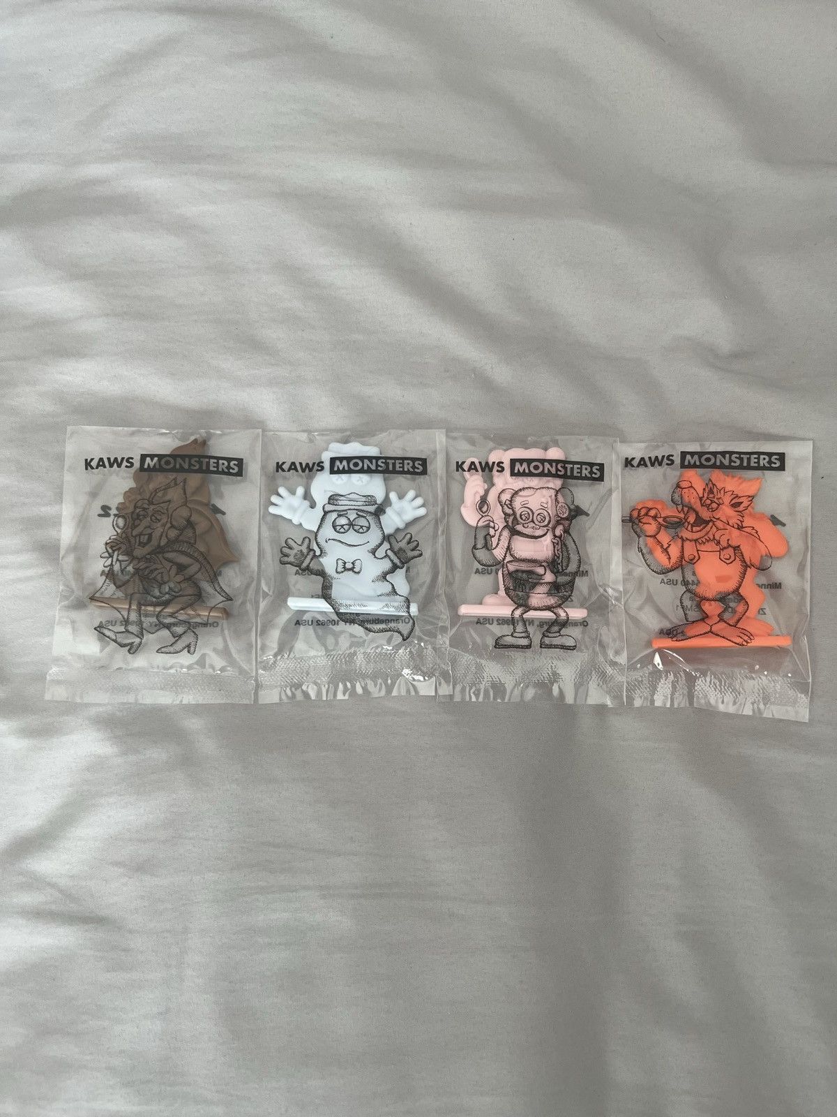 Kaws KAWS x Monster Cereal vinyl figurines Grailed