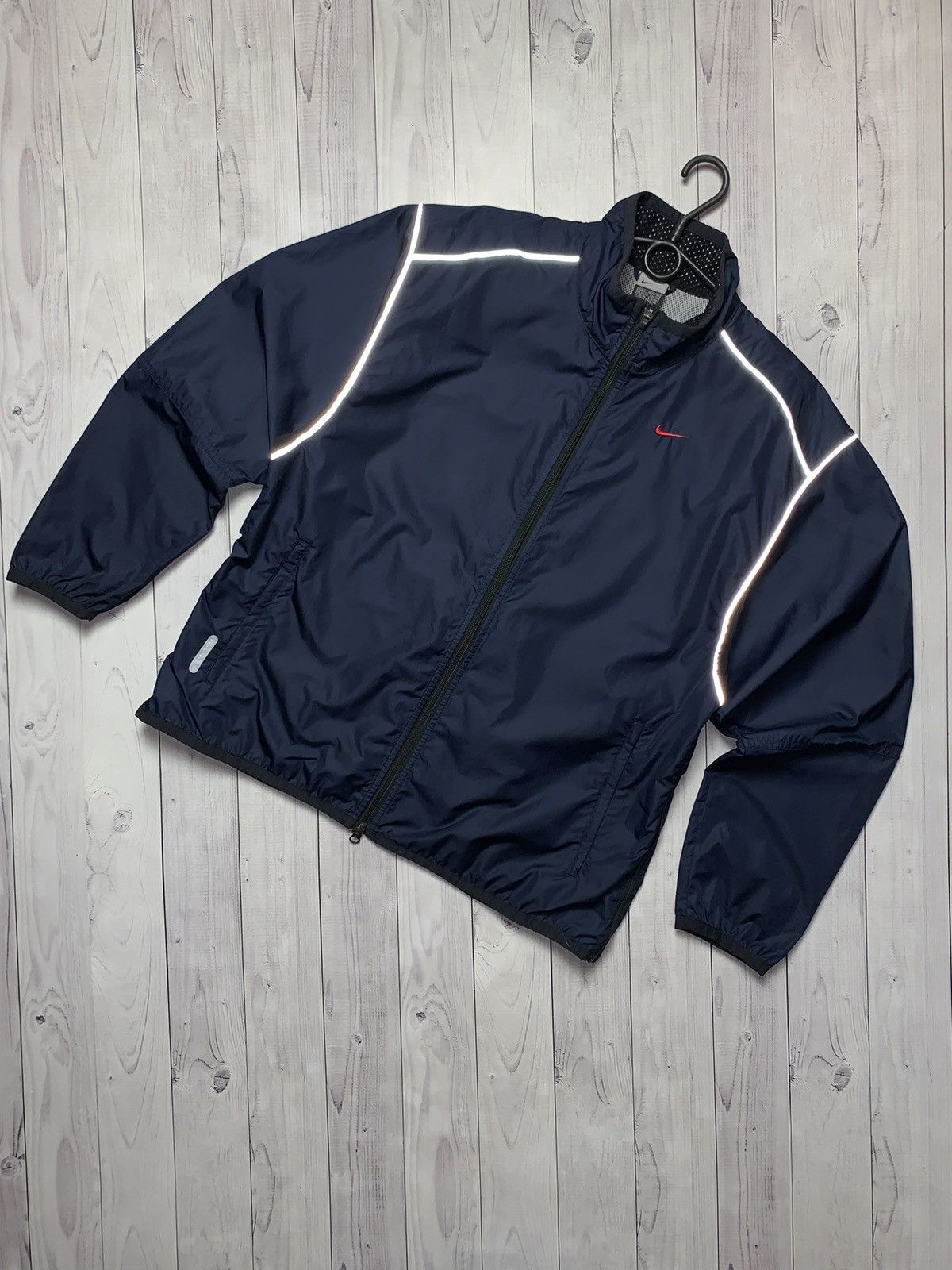 Vintage Nike track jacket size L logo reflective line