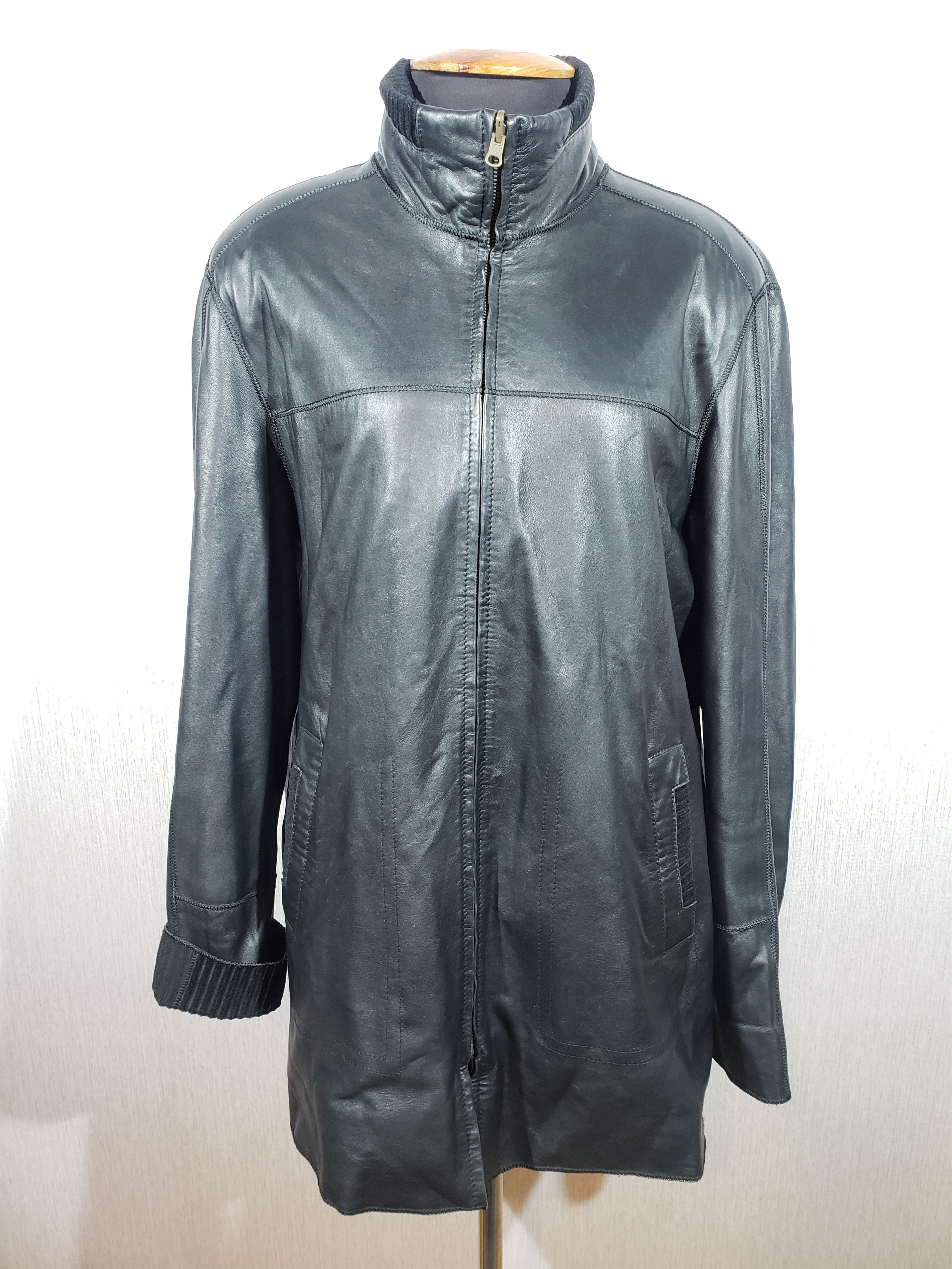 Two-sided men's leather jacket of black color.