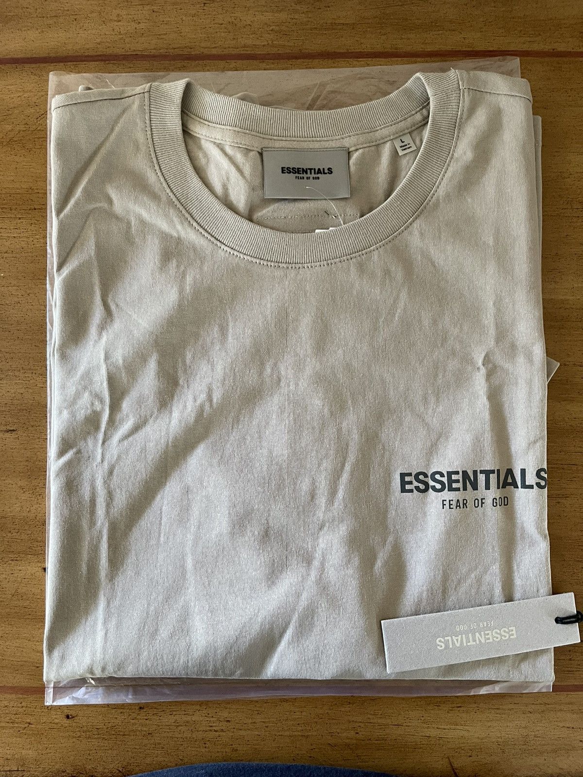Pacsun FOG - Essentials Fear Of God Tan Logo-Print Jersey T-Shirt | Grailed