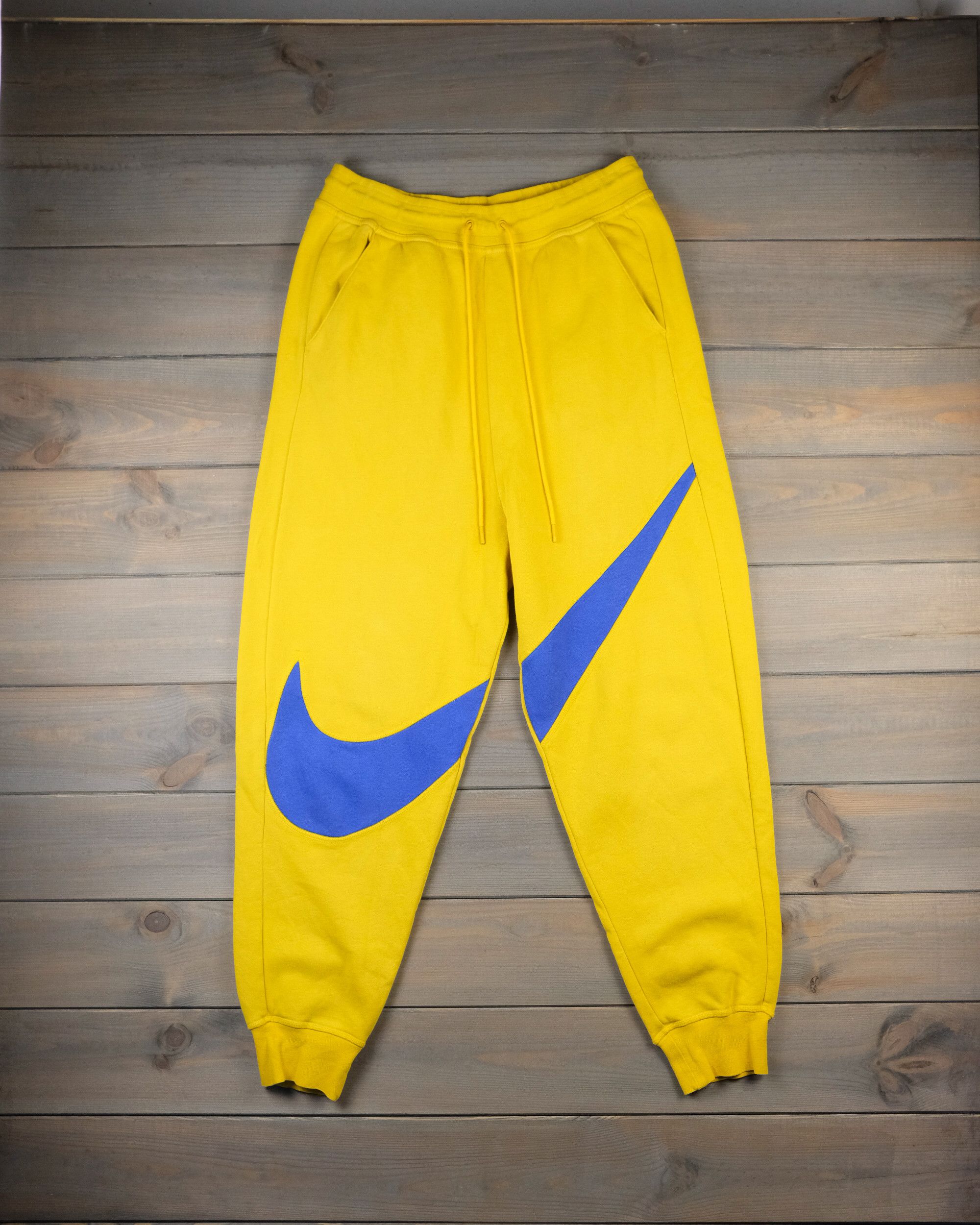 nike mini swoosh oversized joggers yellow