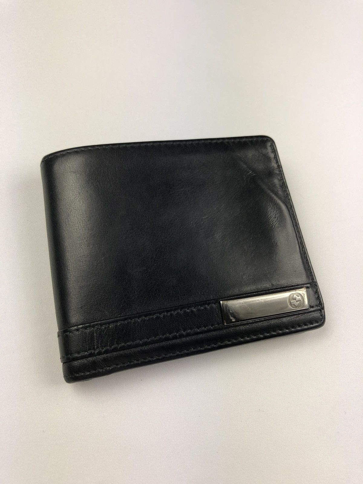 Gucci leather GG bifold wallet