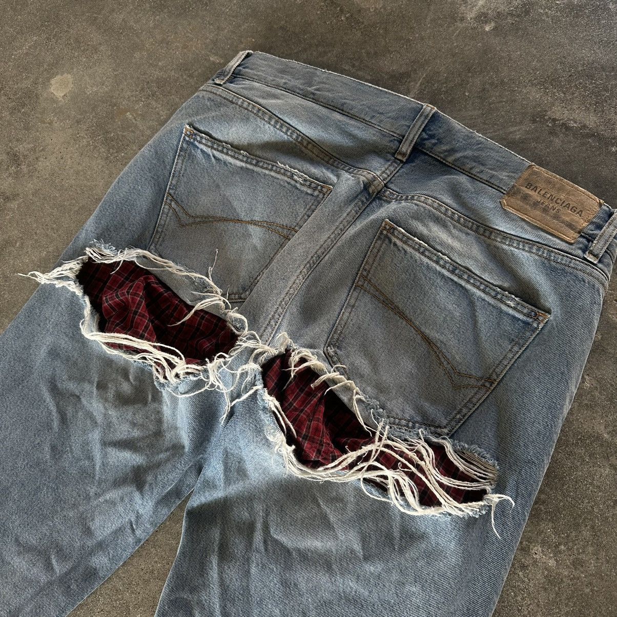 Distressed boxer short layered denim
