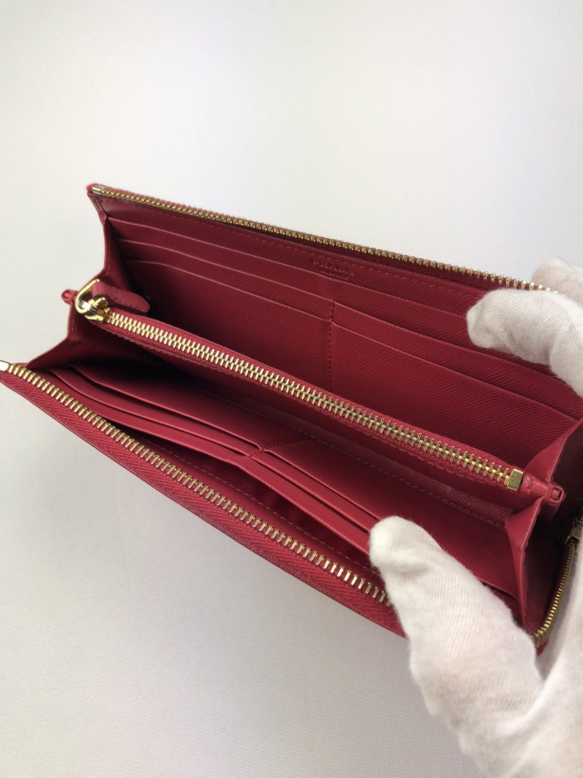 Prada saffiano metal leather zippy wallet