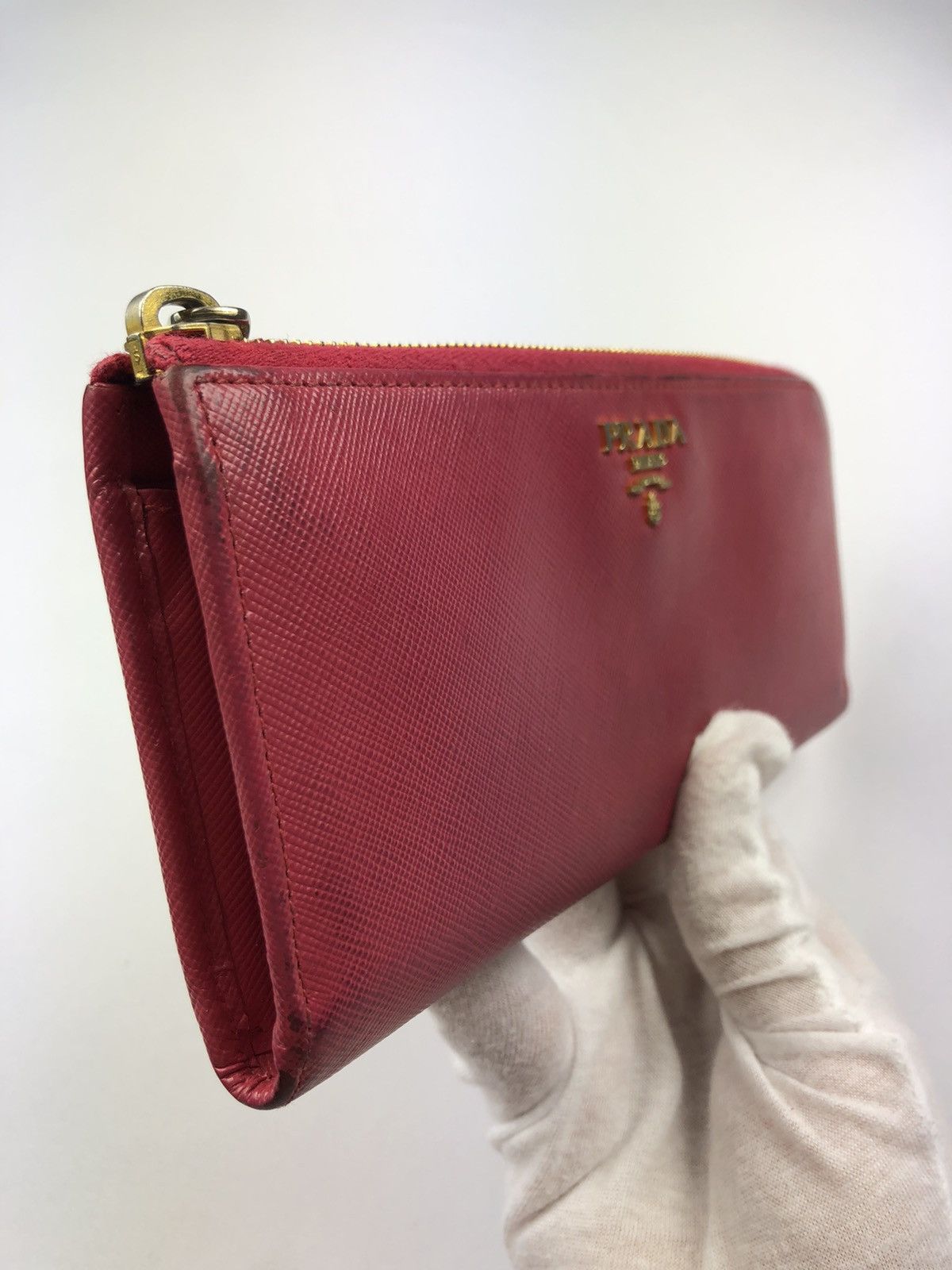 Prada saffiano metal leather zippy wallet