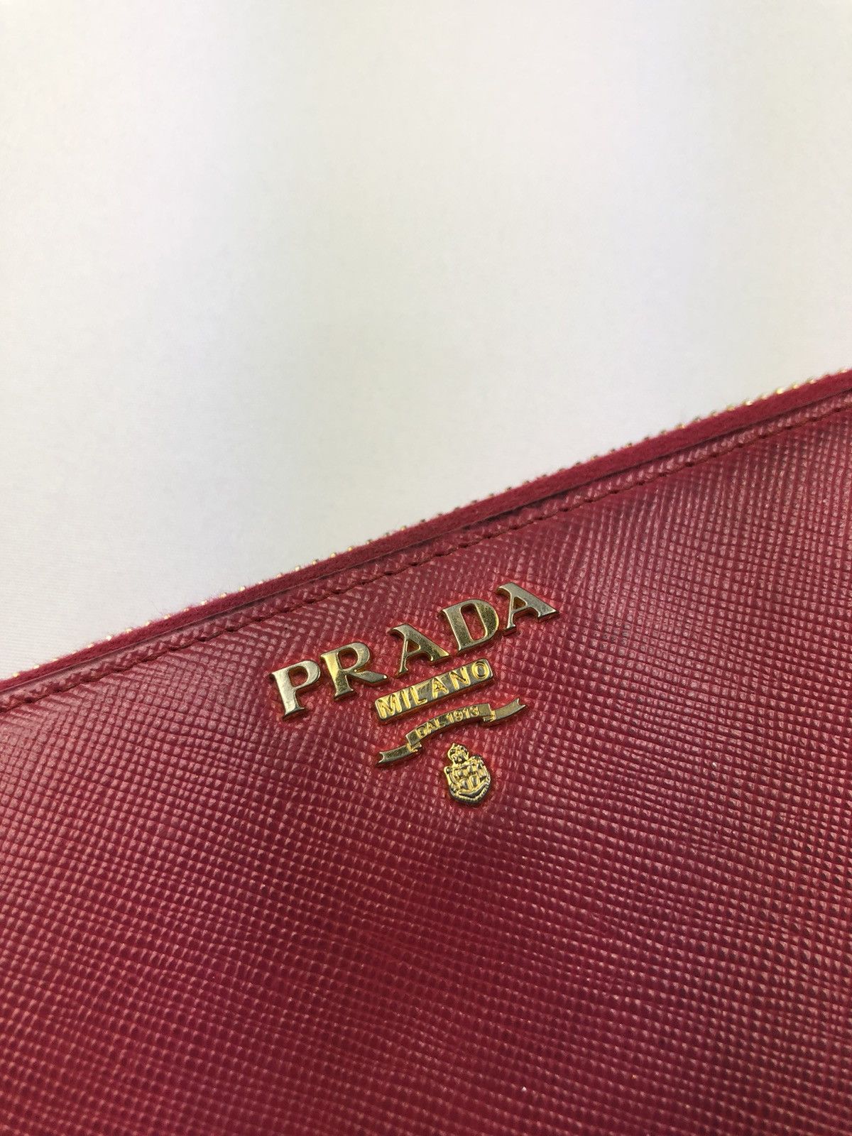 Prada saffiano metal leather zippy wallet