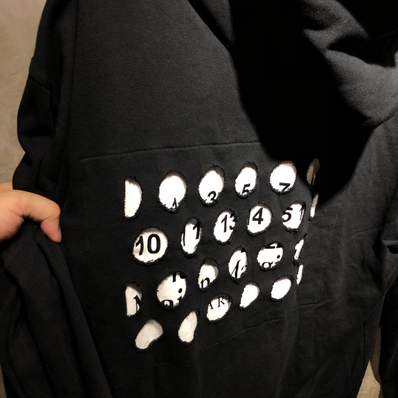 Maison margiela hole hoodie hot sale