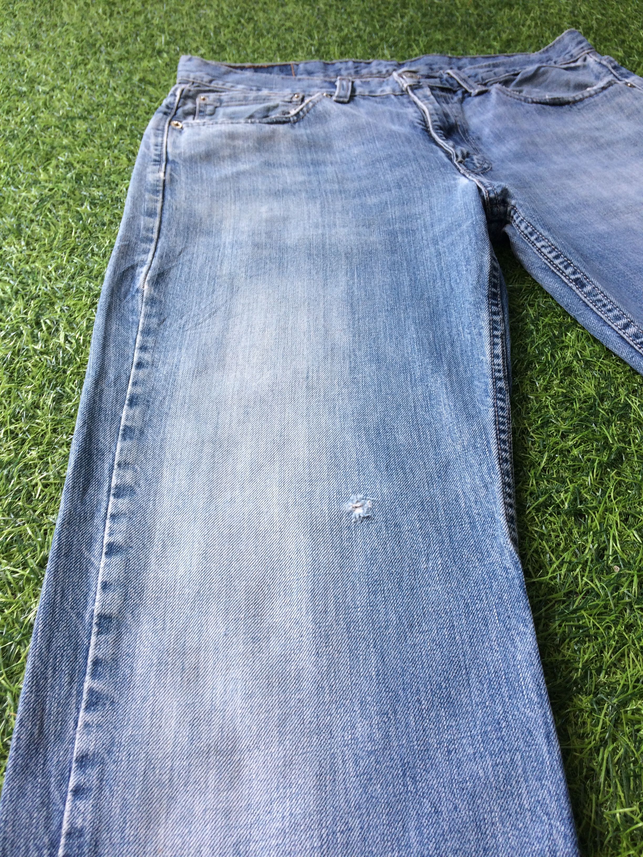 Levi's Vintage Levis 514 Distressed Jeans Light Wash Blue #B-755 Size US 33 - 6 Thumbnail