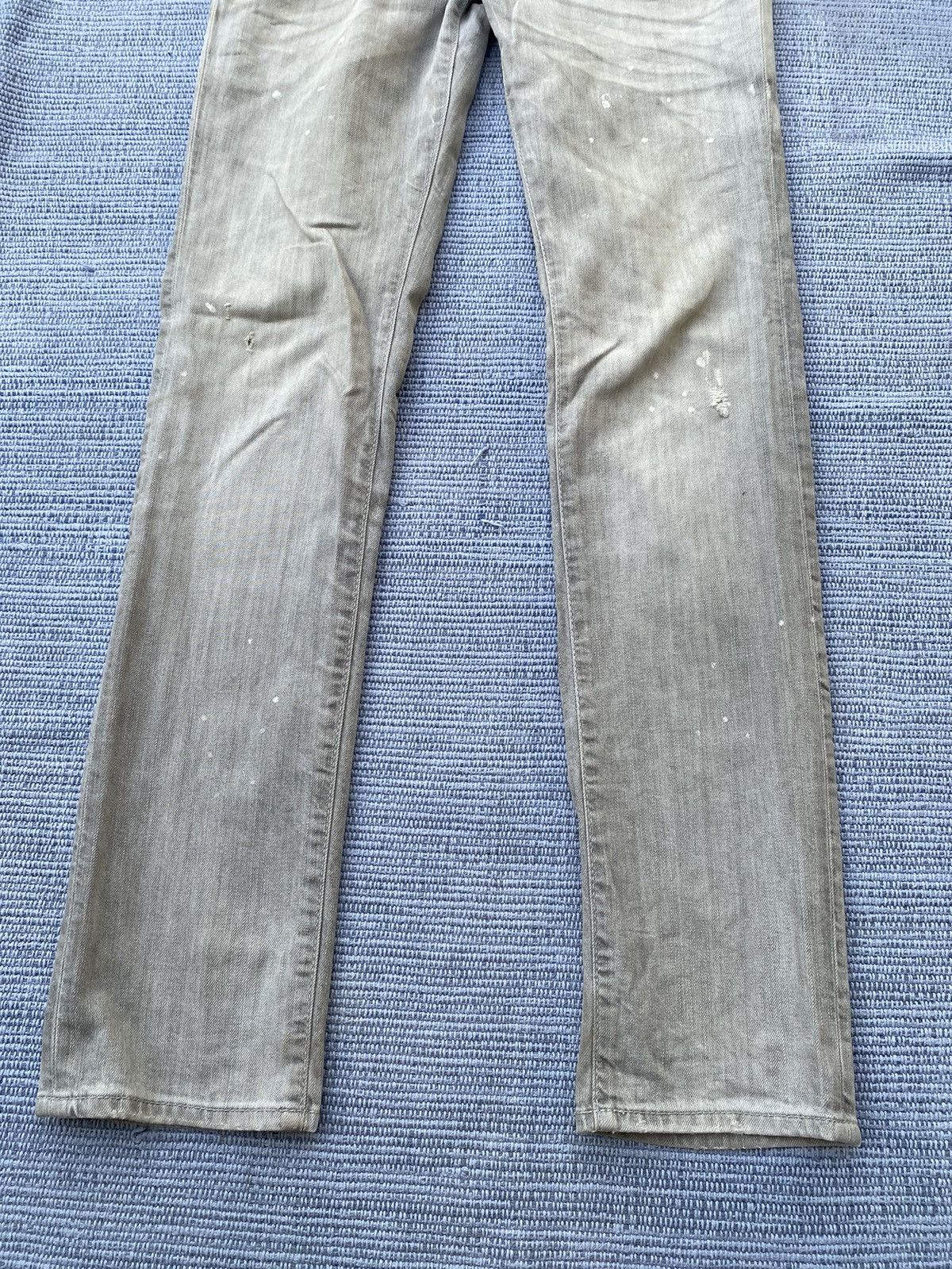 grey painted jeans