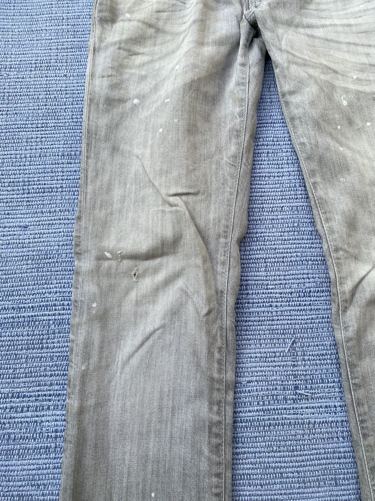 grey painted jeans