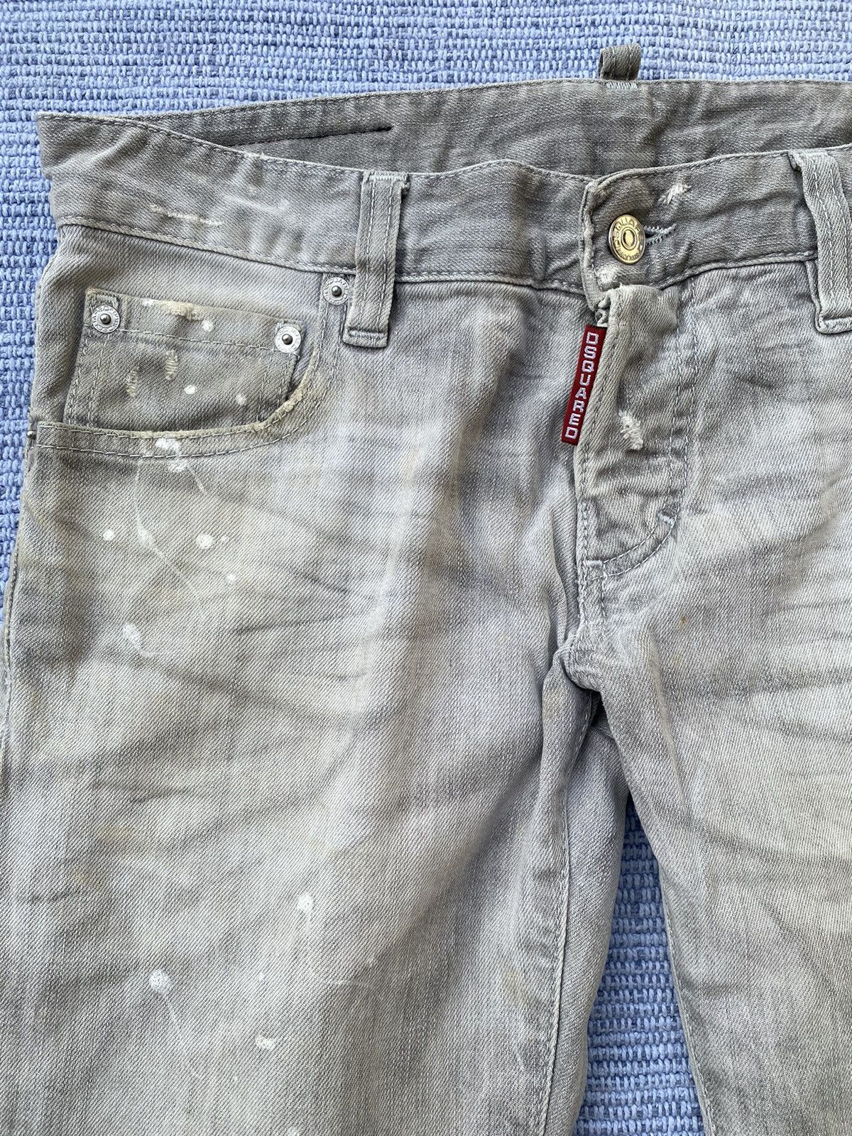 grey painted jeans