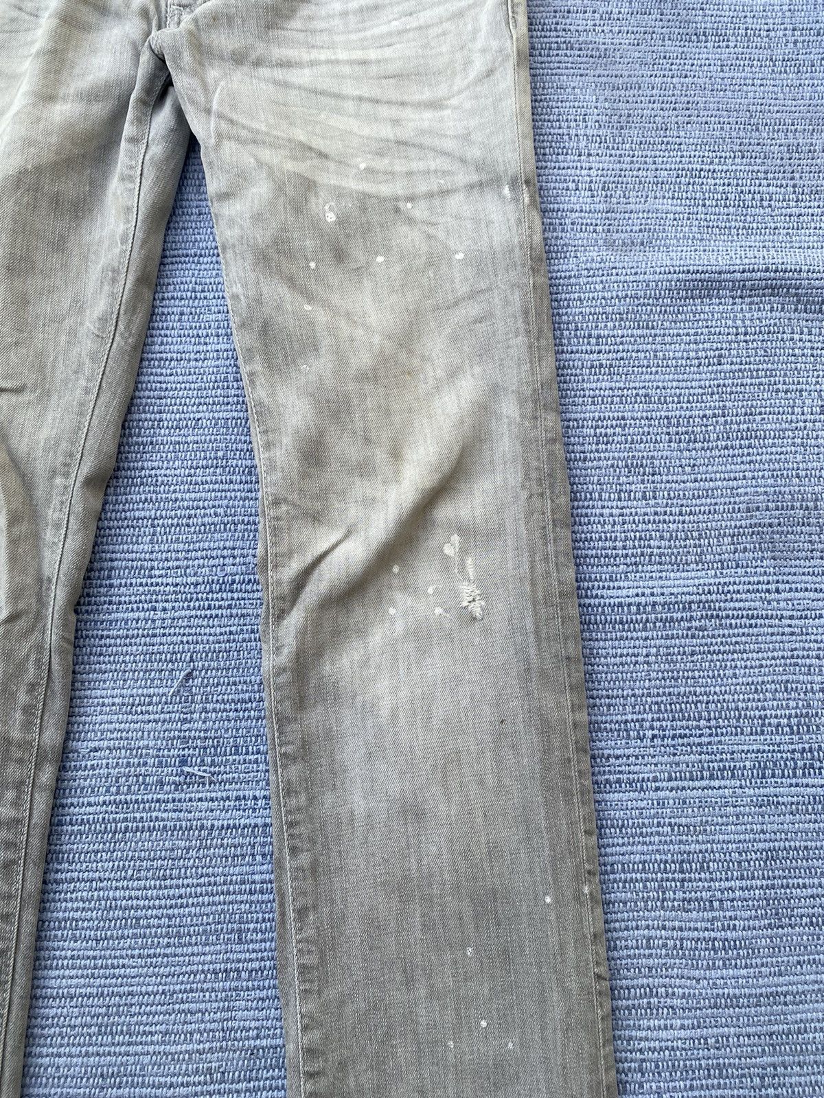 grey painted jeans