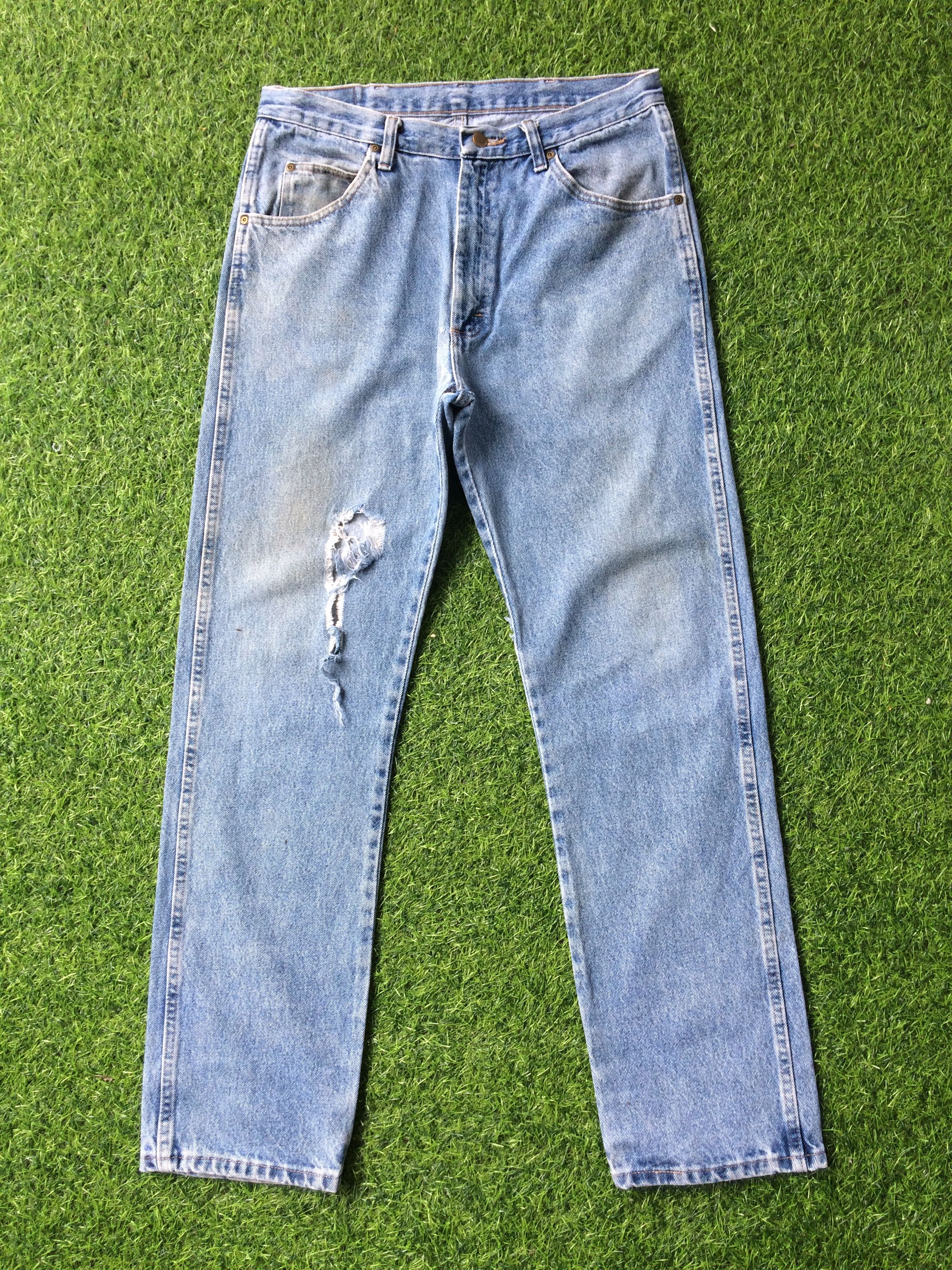Vintage Vintage Distressed Ripped Light Wash Jeans #B-452 Size US 33 - 1 Thumbnail