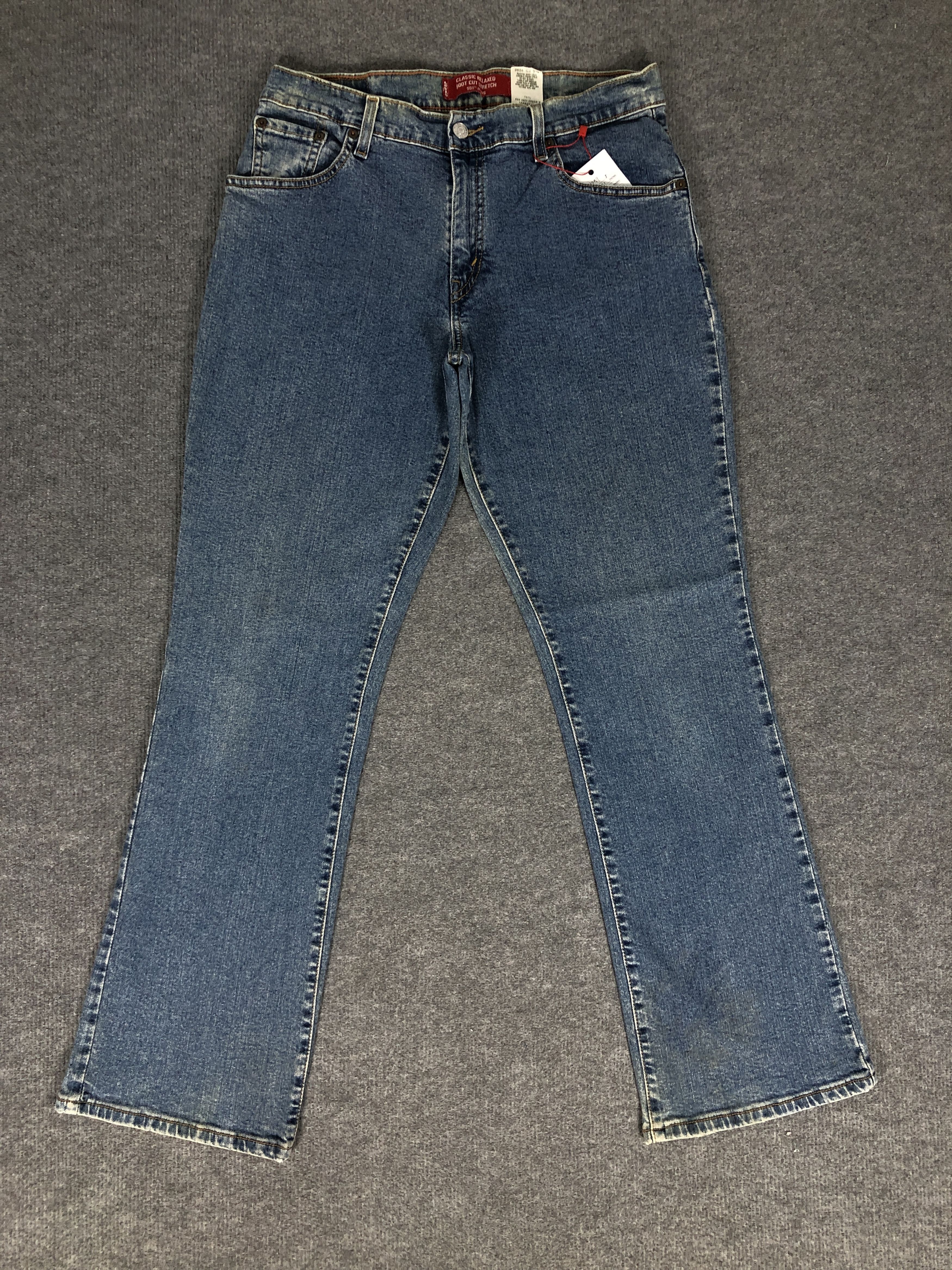 Levi's × Vintage VTG Y2K Levi's 550 Boot Cut Stretch Dirty Blue Denim Jean Size 31" - 1 Thumbnail