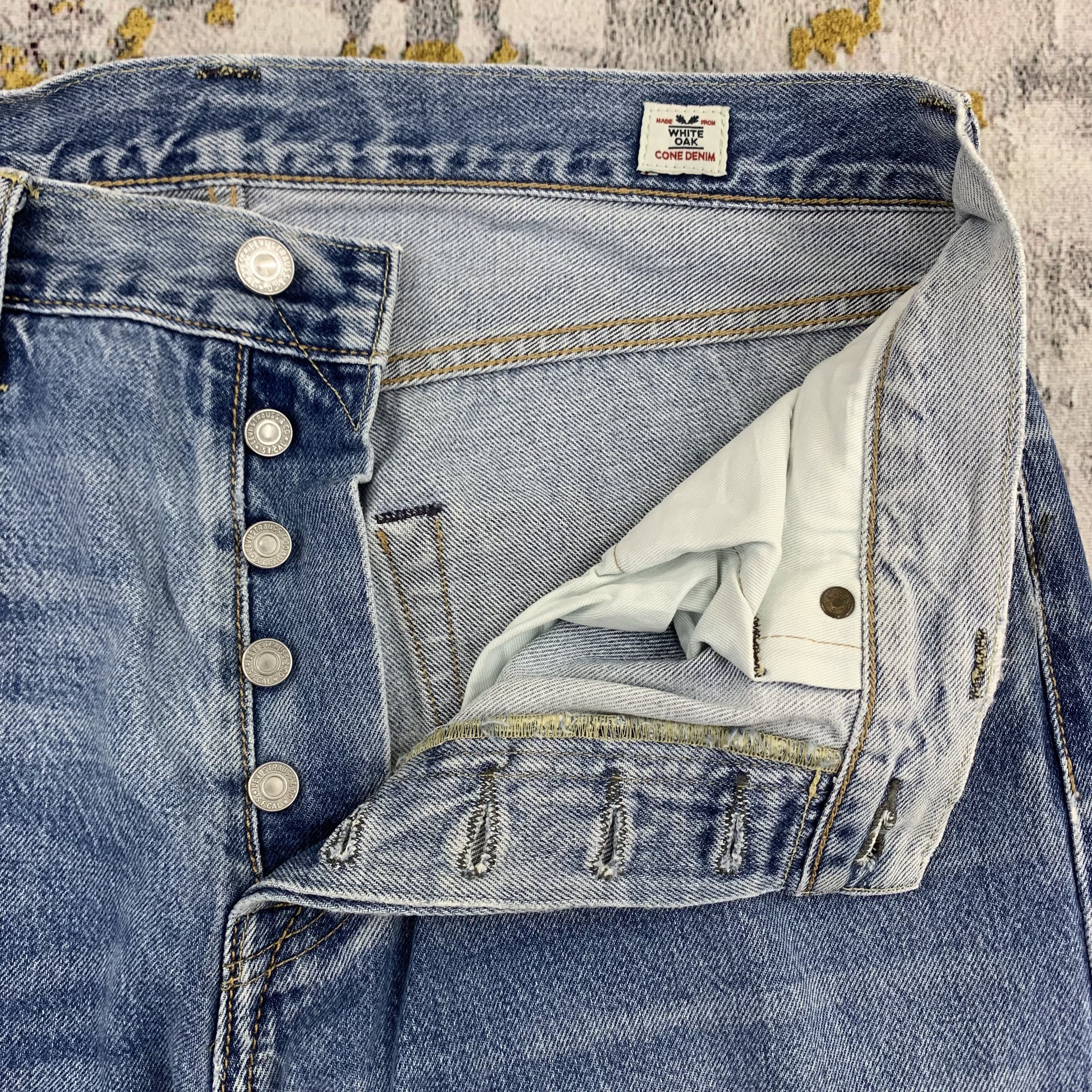 Distressed Levi's 501 Blue Denim