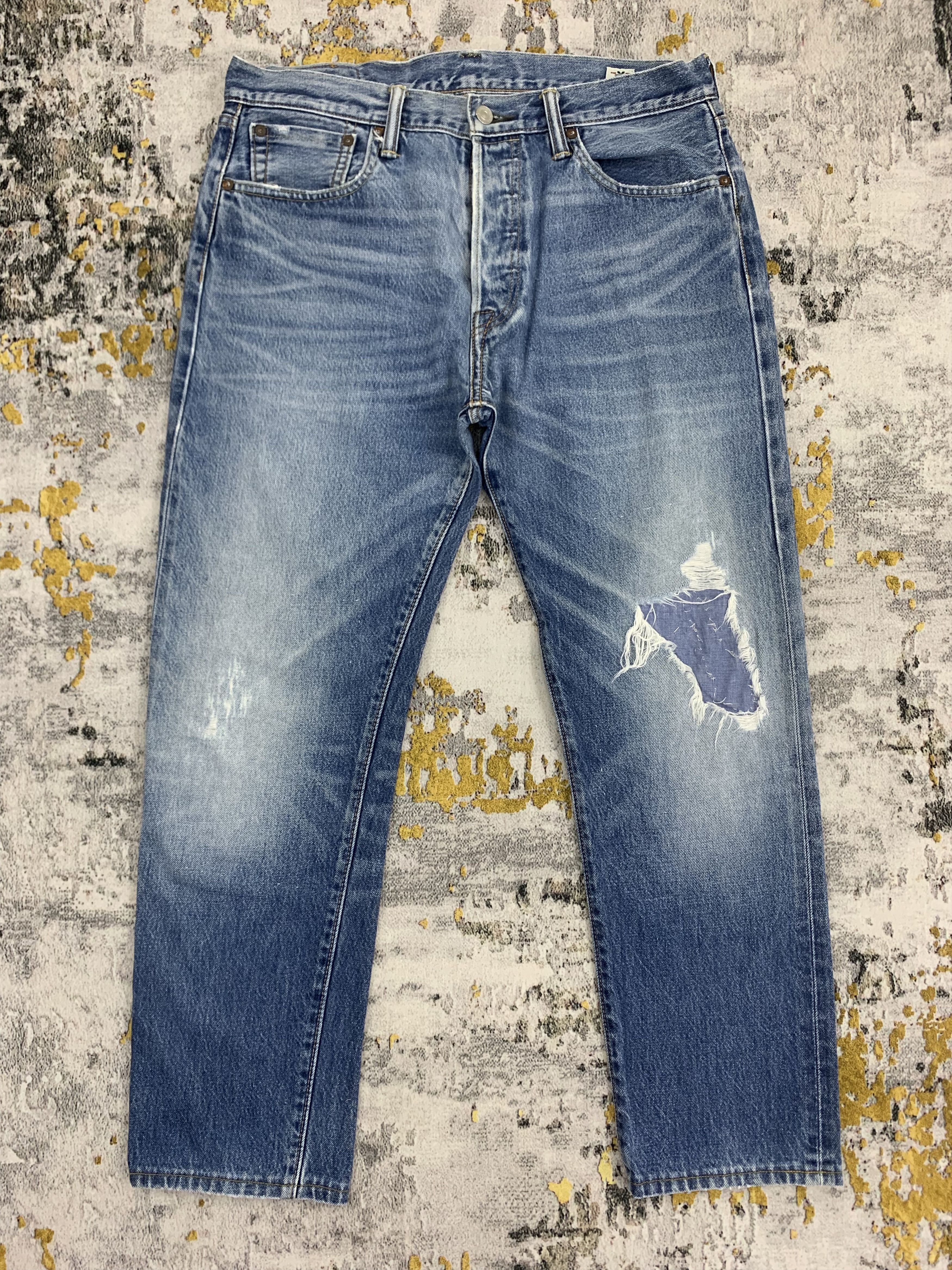 Distressed Levi's 501 Blue Denim
