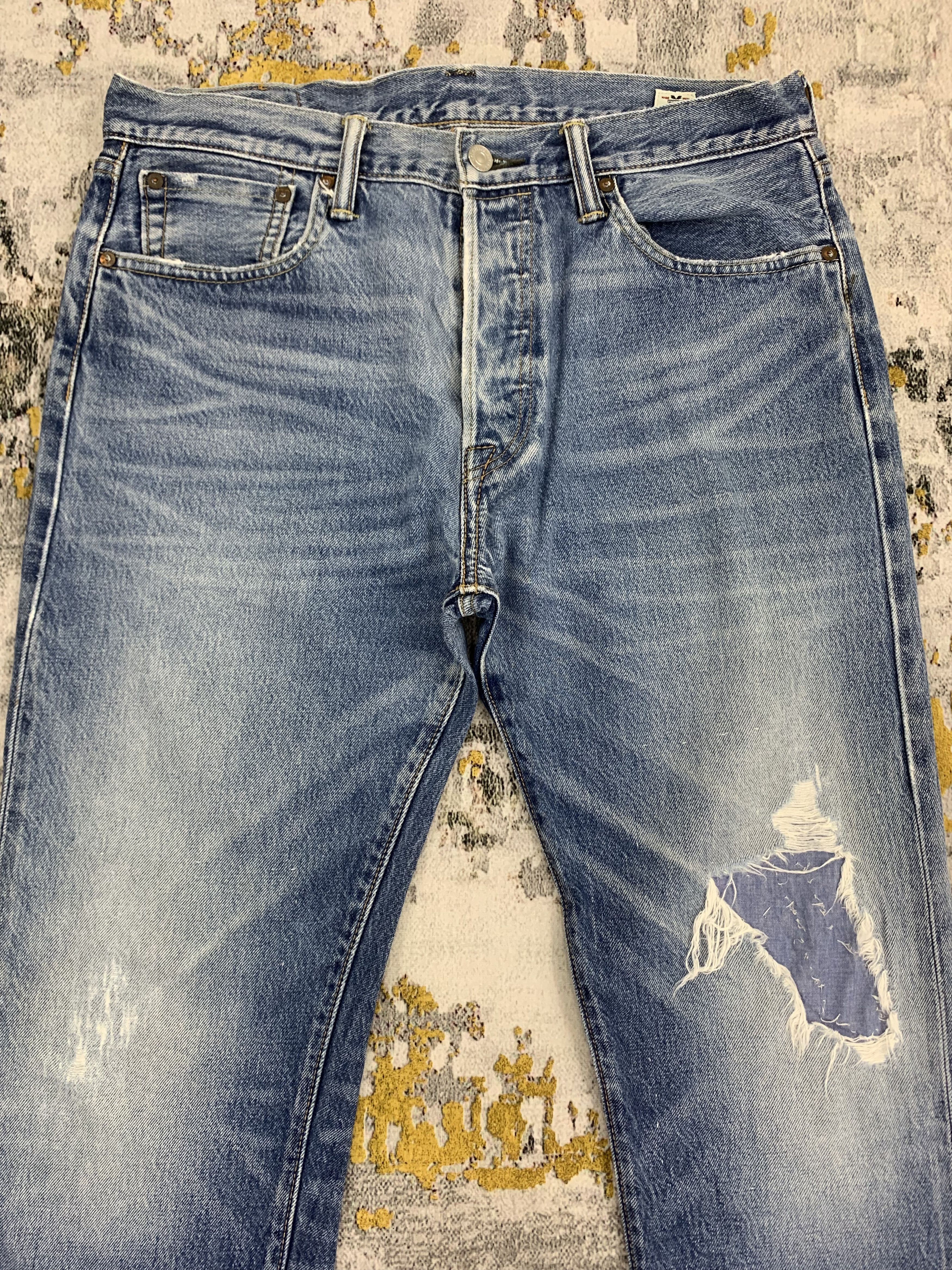 Distressed Levi's 501 Blue Denim