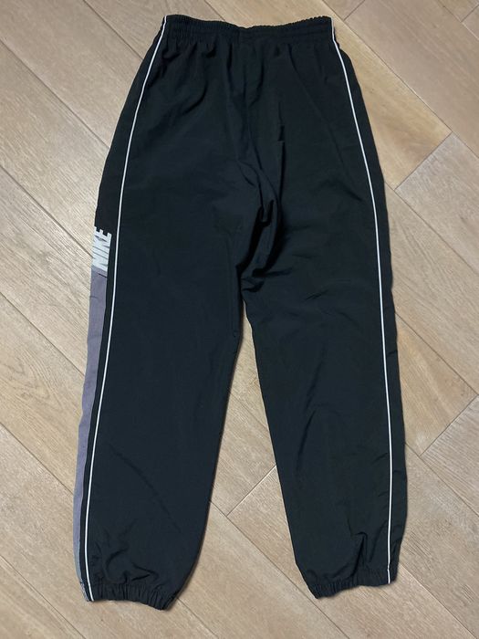 Nike Nike vintage black track pants small swoosh spell out