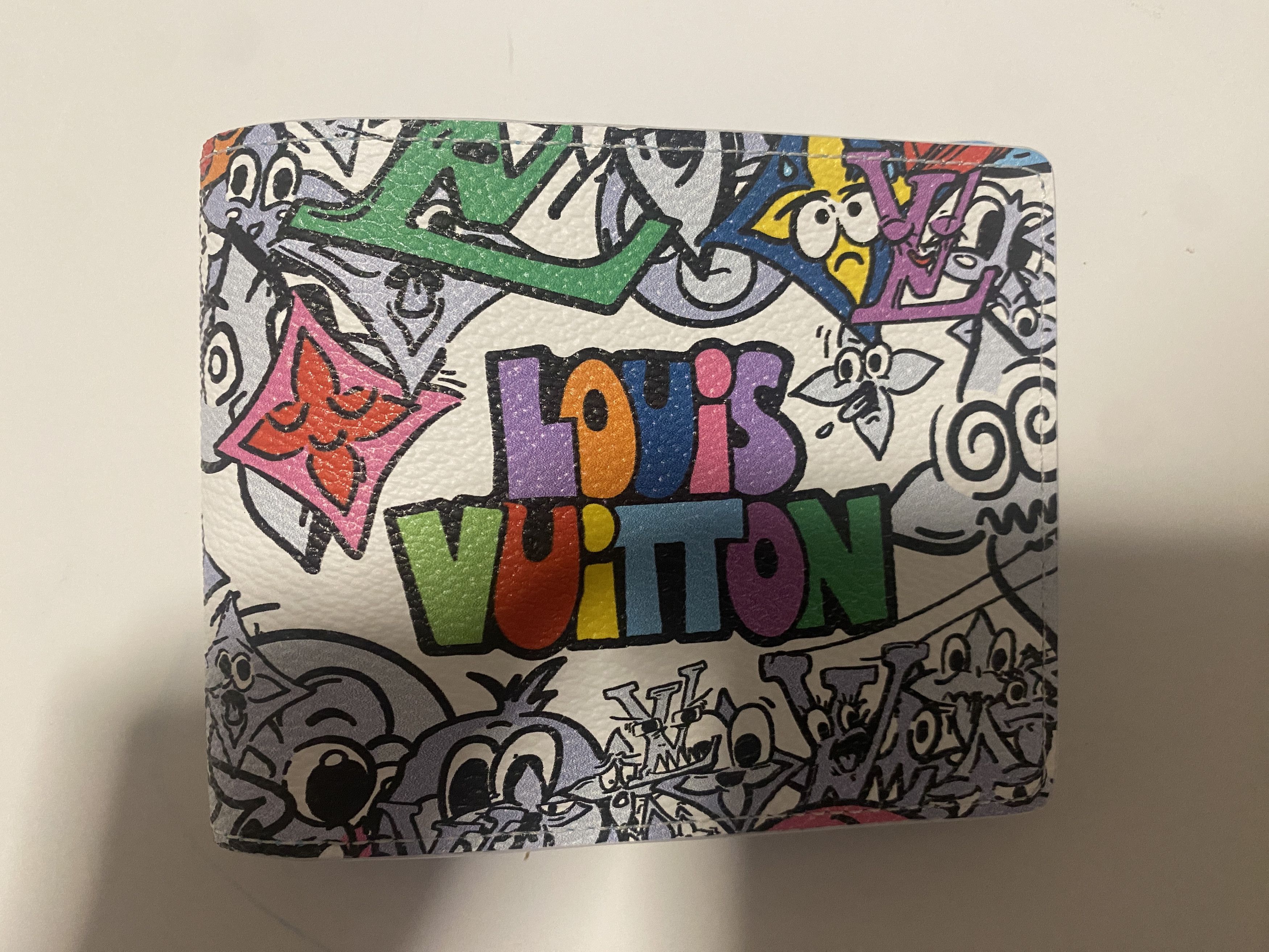 Louis Vuitton Louis Vuitton Monogram Comics Multiple Wallet | Grailed