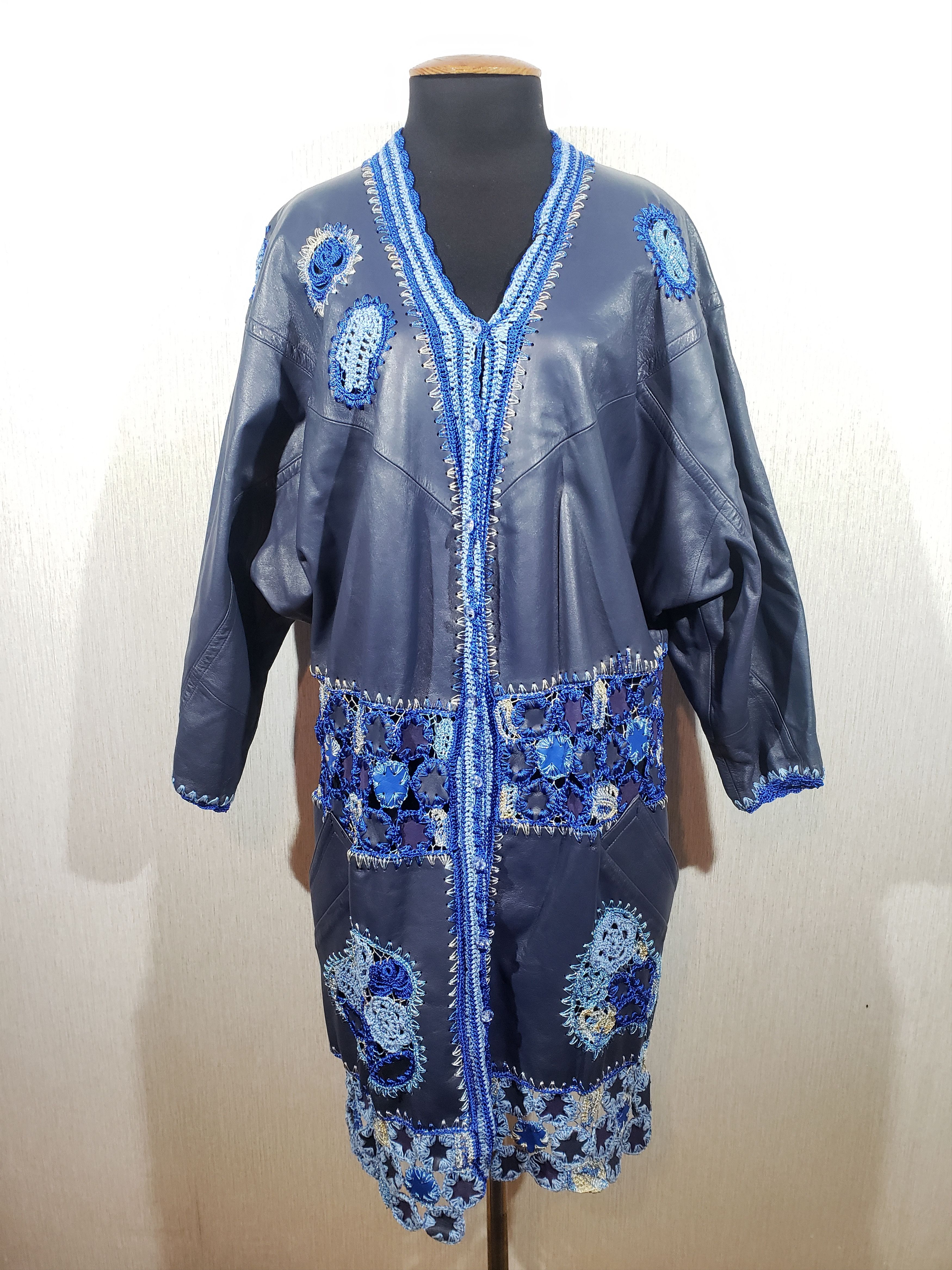 Cute long jacket handmade in blue leather.