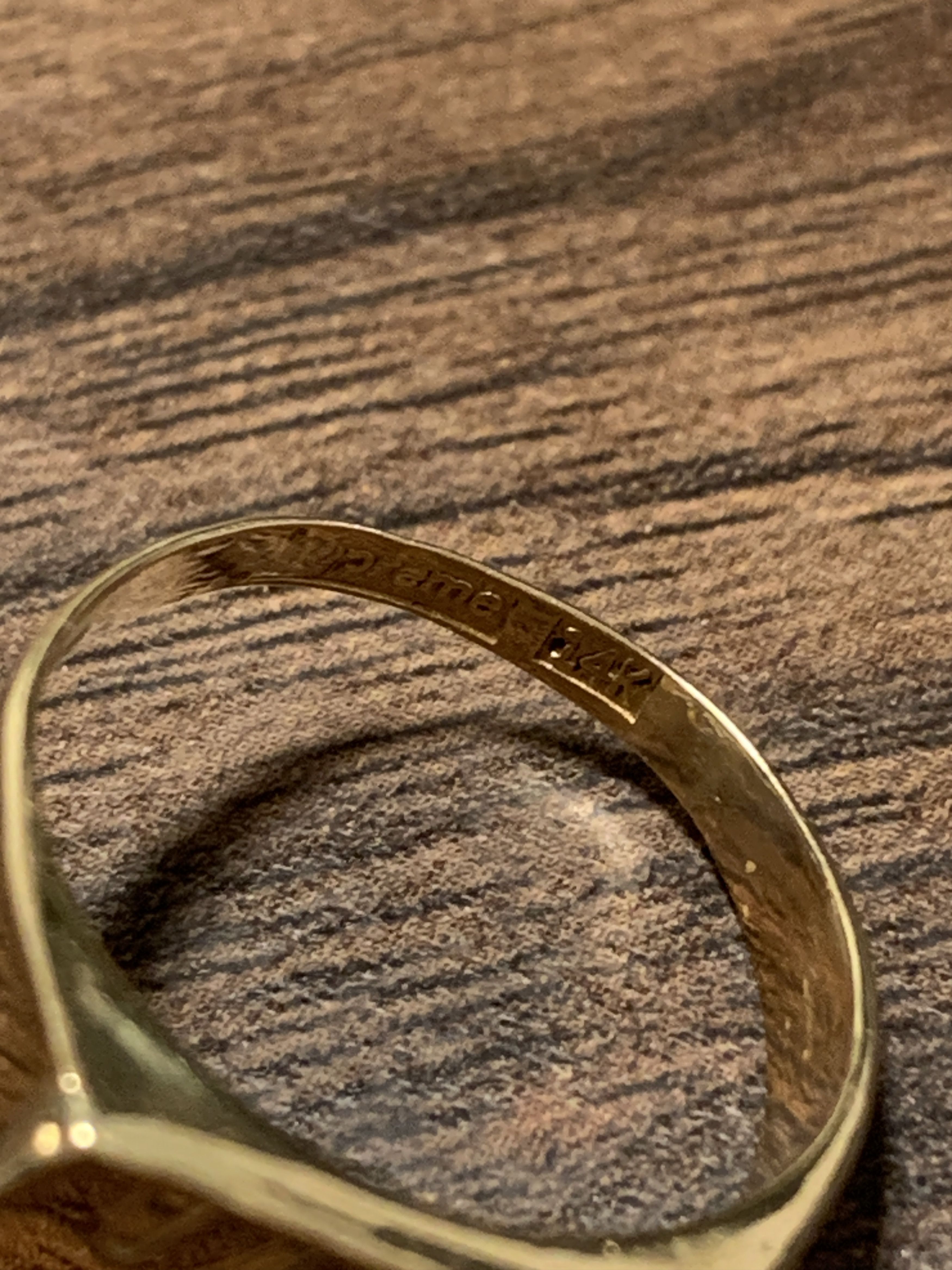 Supreme x nike gold 2024 ring