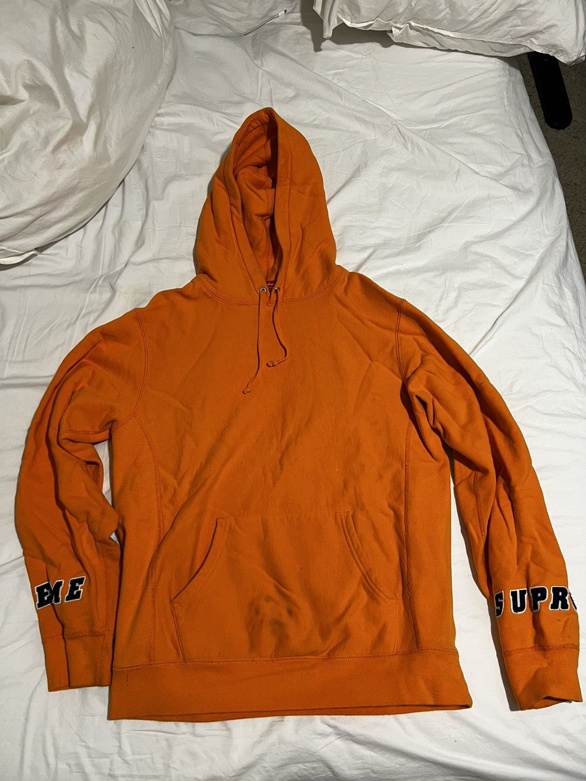 Supreme unboxing orange hoodie with embossed