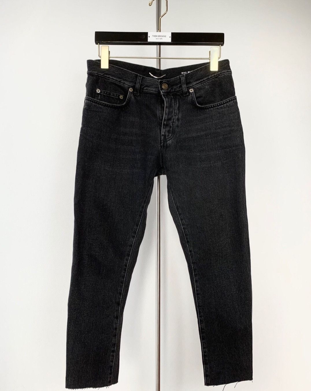 saint laurent frayed fringe jeans