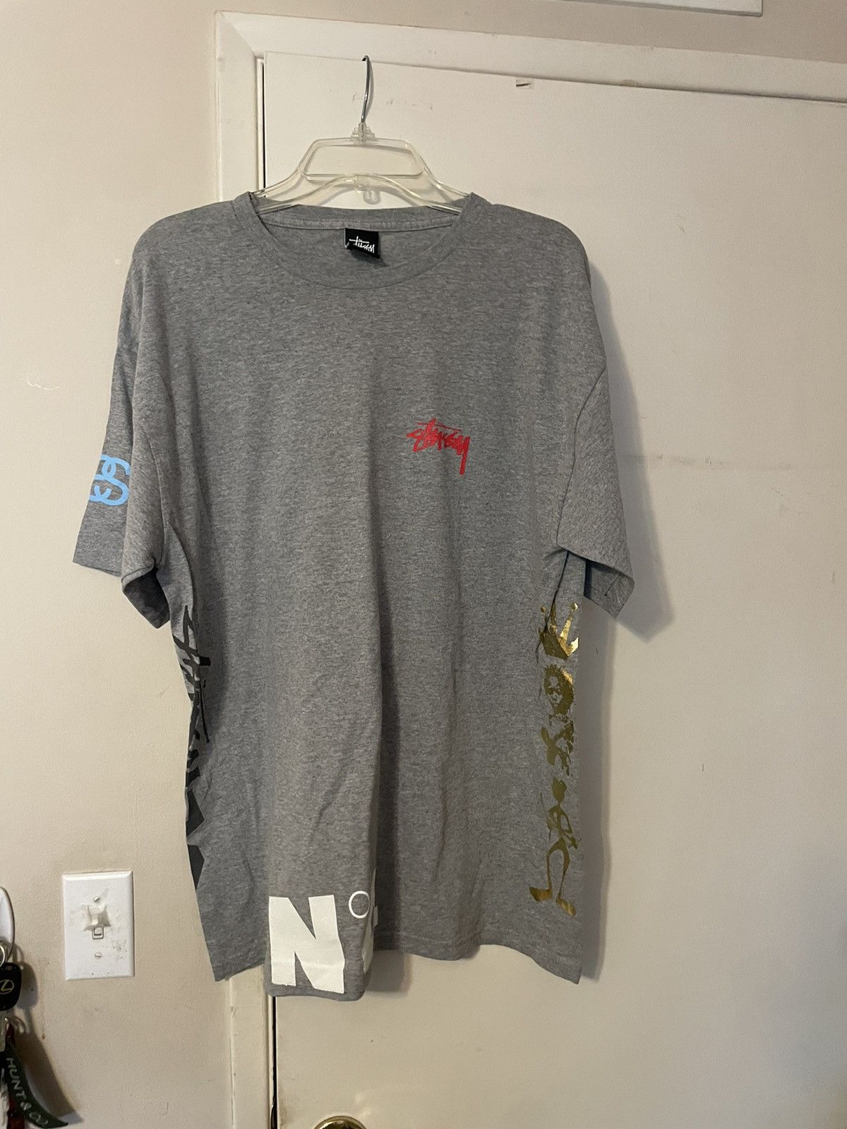 Stussy Logo all over tshirt