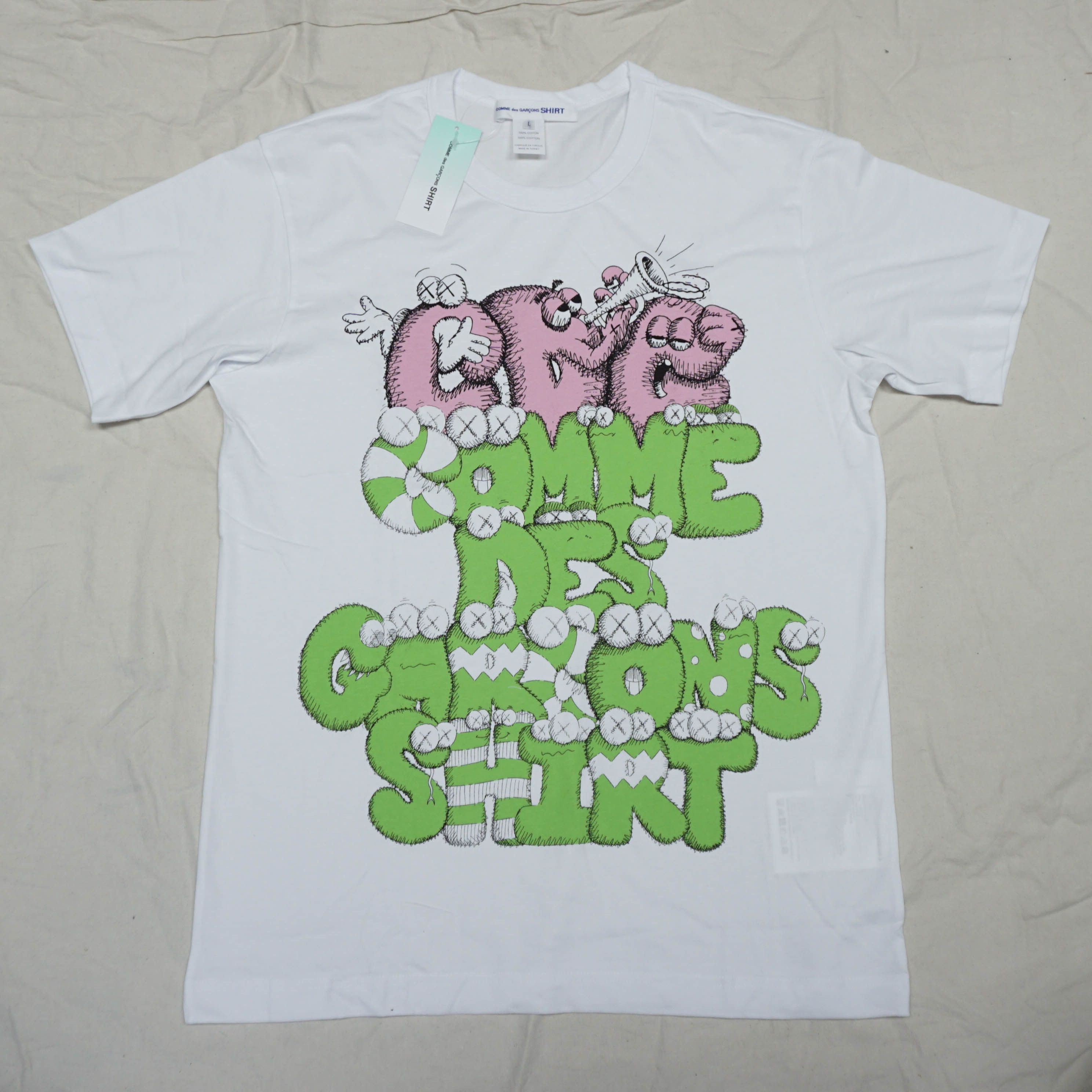 Comme des Garcons × Kaws | Grailed