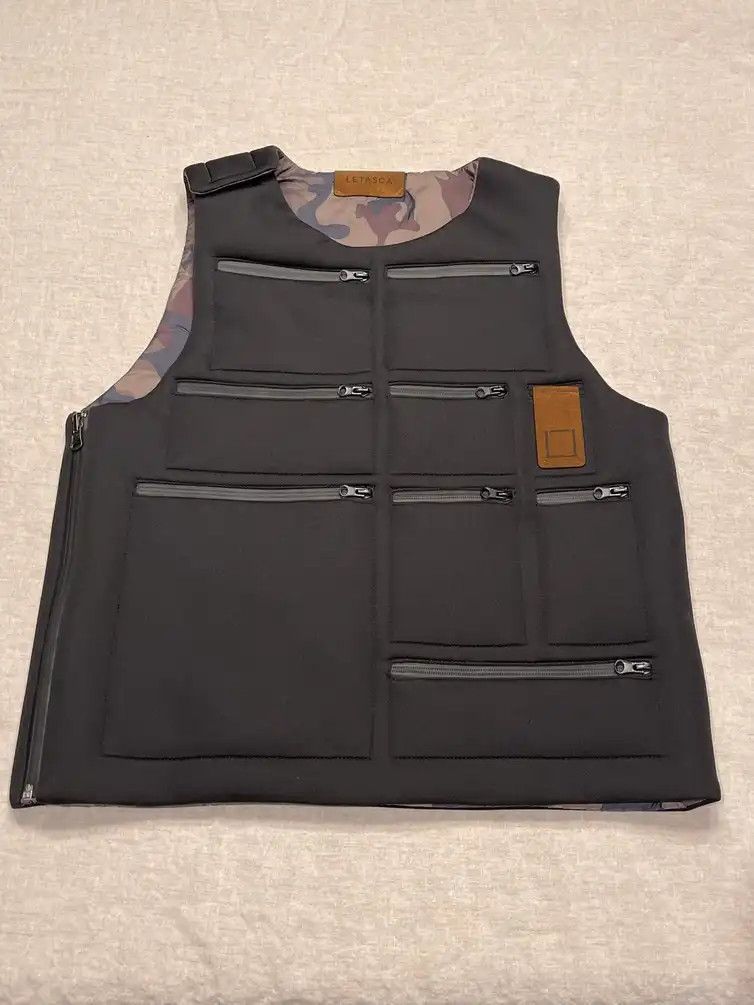 Letasca purchases vest