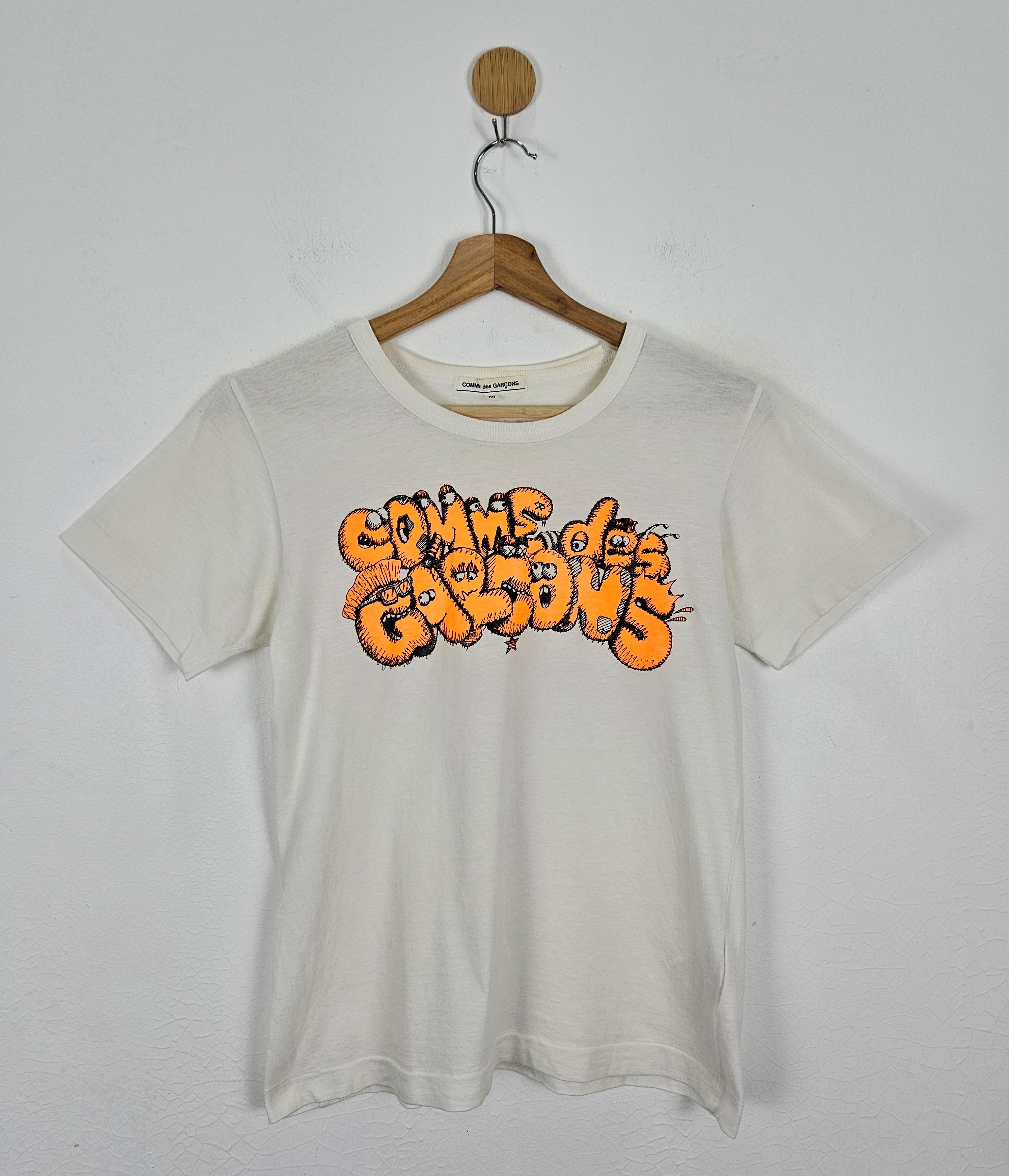 Comme des Garcons Comme des Garcons Kaws Shirt Size XS / US 0-2 / IT 36-38 - 1 Thumbnail