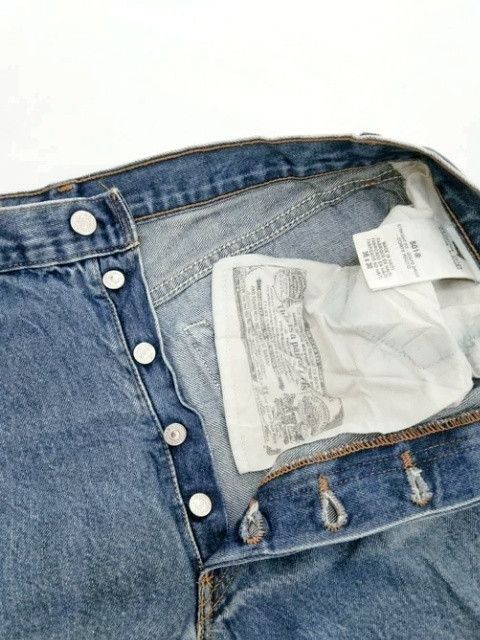 Vintage Levi's 501 Faded Blue Distressed Jeans 34x29
