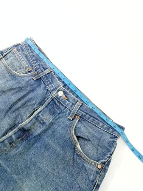 Vintage Levi's 501 Faded Blue Distressed Jeans 34x29