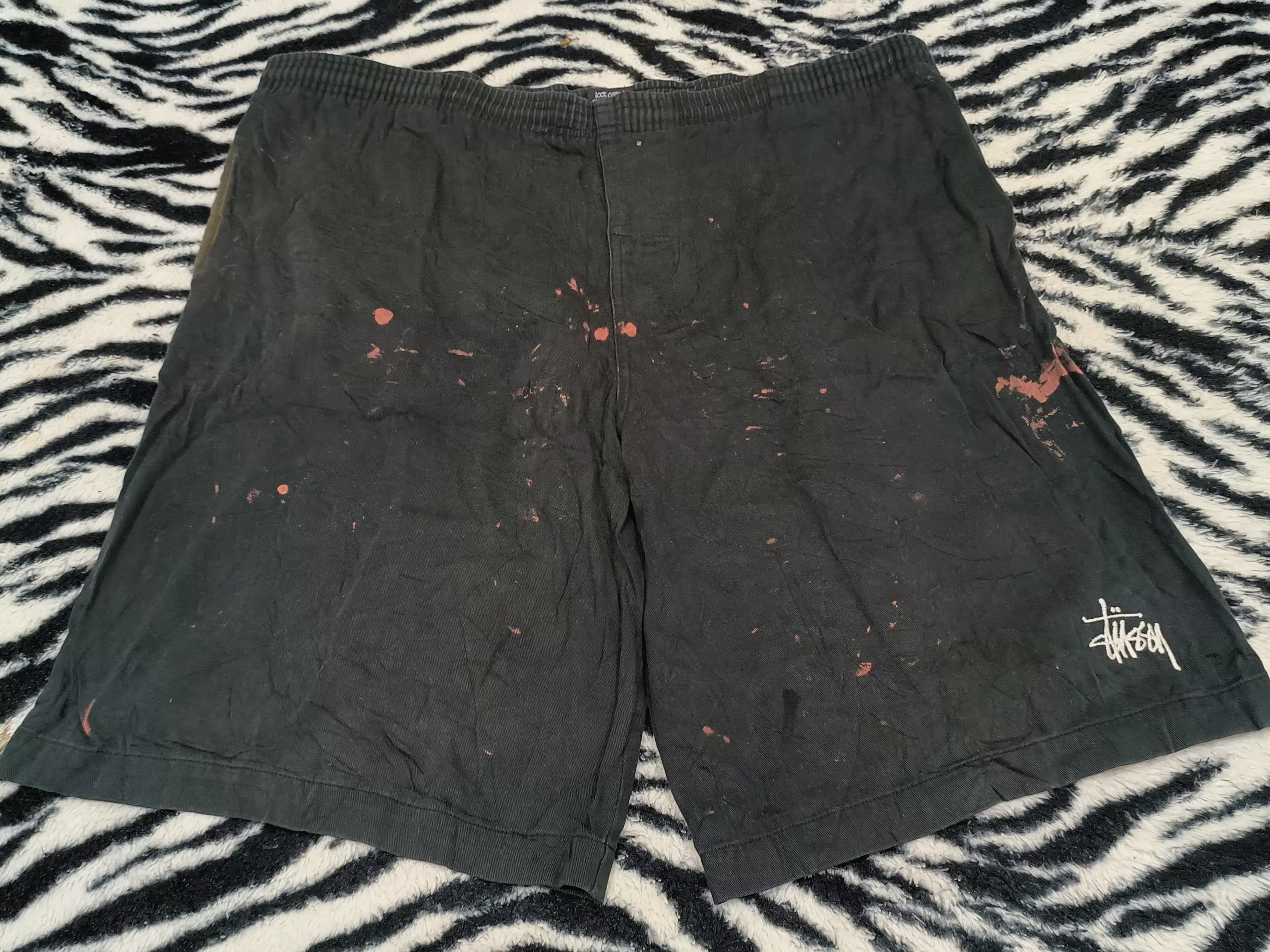 Distressed Stussy short pants