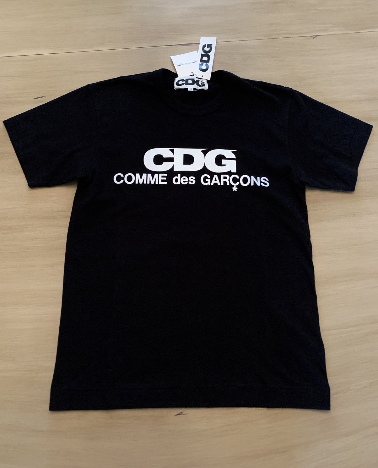 Very Rare Rare Comme des Garcons CDG Spell Out Tee size Small | Grailed