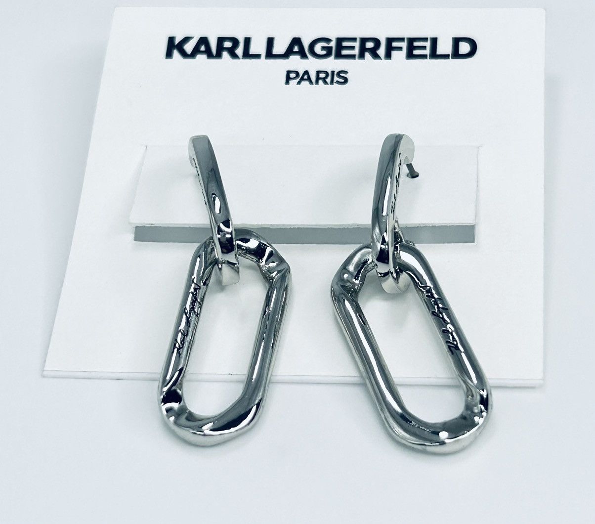 KL clip earrings