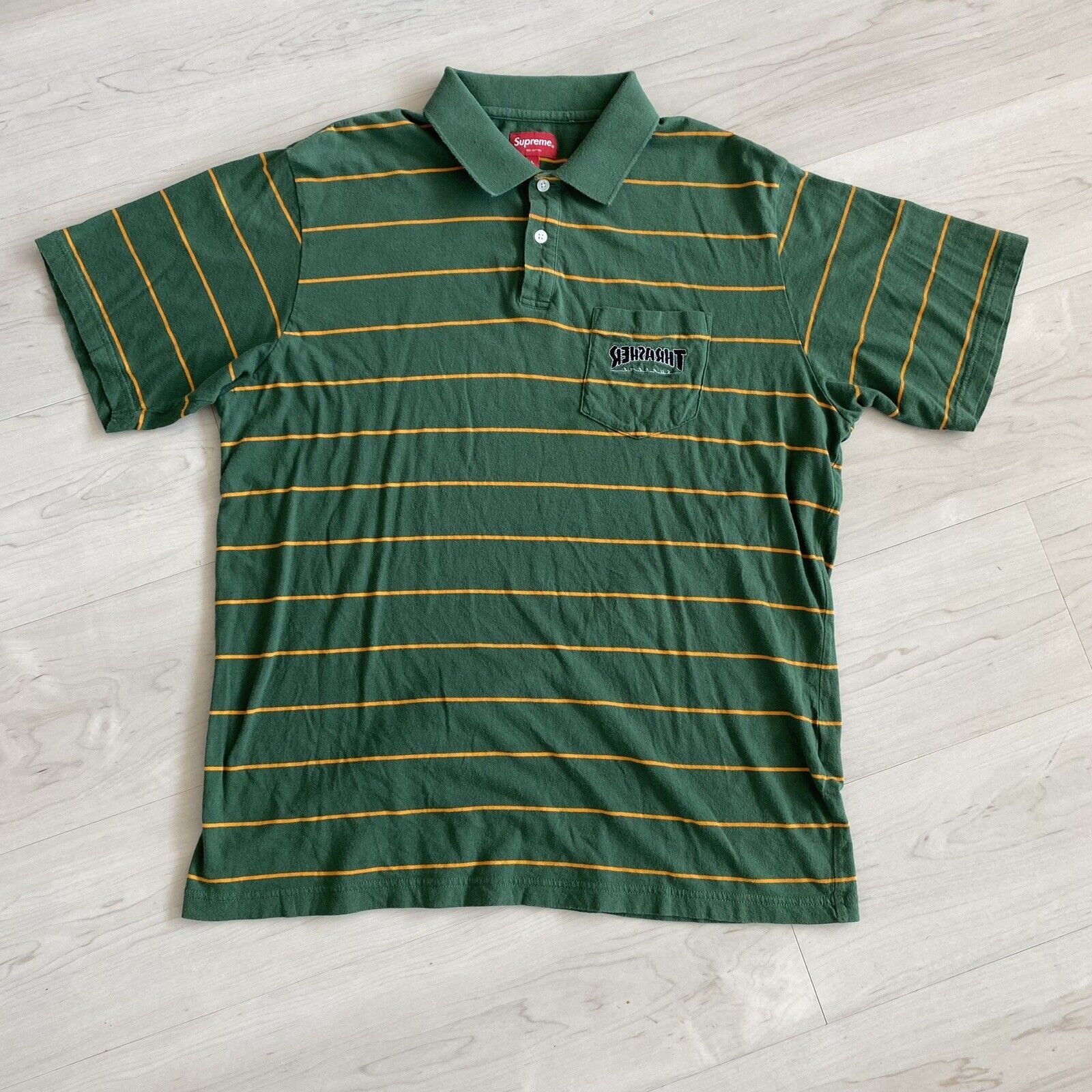 Supreme Thrasher Stripe Polo (FW21) - $98