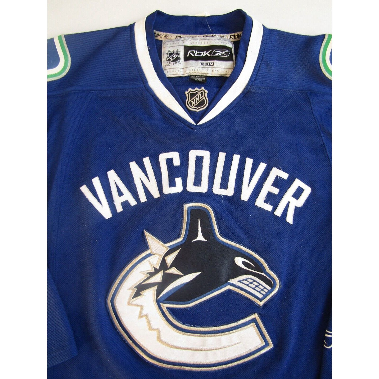 Reebok Vancouver Canuks Ice hockey jersey Reebok NHL small blue JUMT989 ...