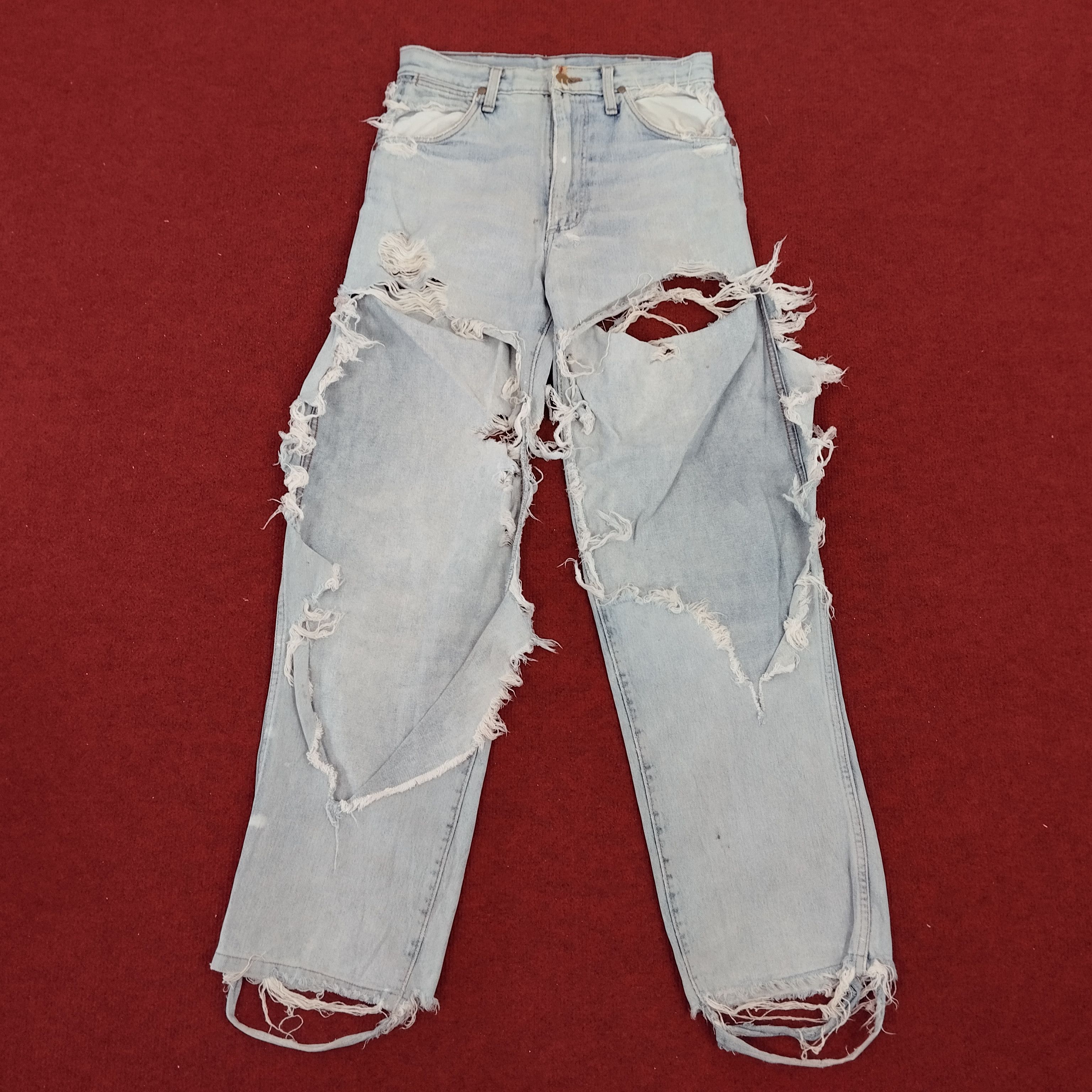 image of Distressed Denim x Vintage Wrangler Distressed Vintage Denim Jeans in Light Blue Jeans (Size 28)