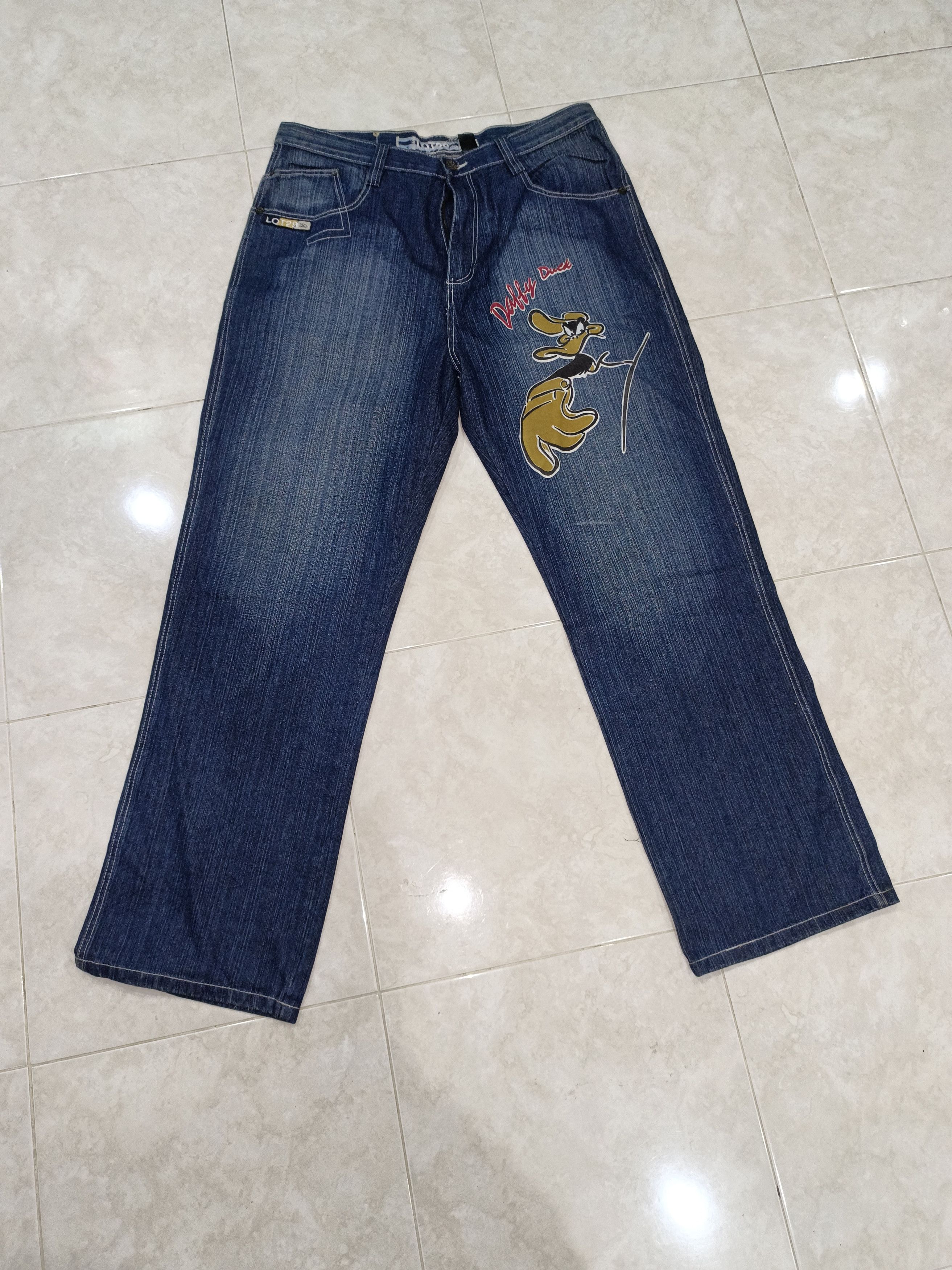 Vintage Lot 29 popular Looney Tunes Blue Denim Jeans Sz 42