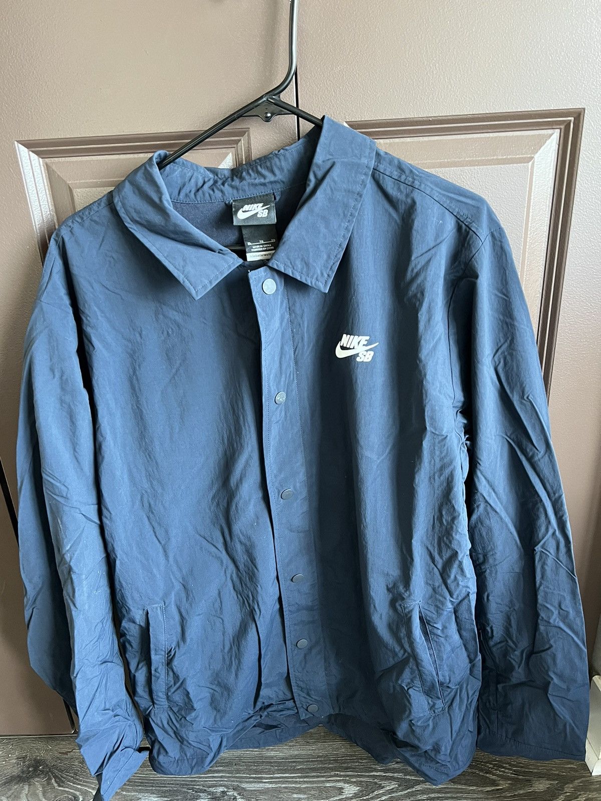 Nike sb coach jacket navy best sale