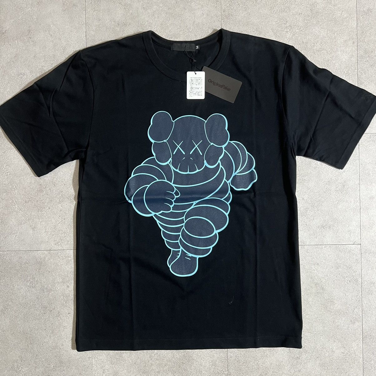 Kaws Original Fake Michelin Man tee