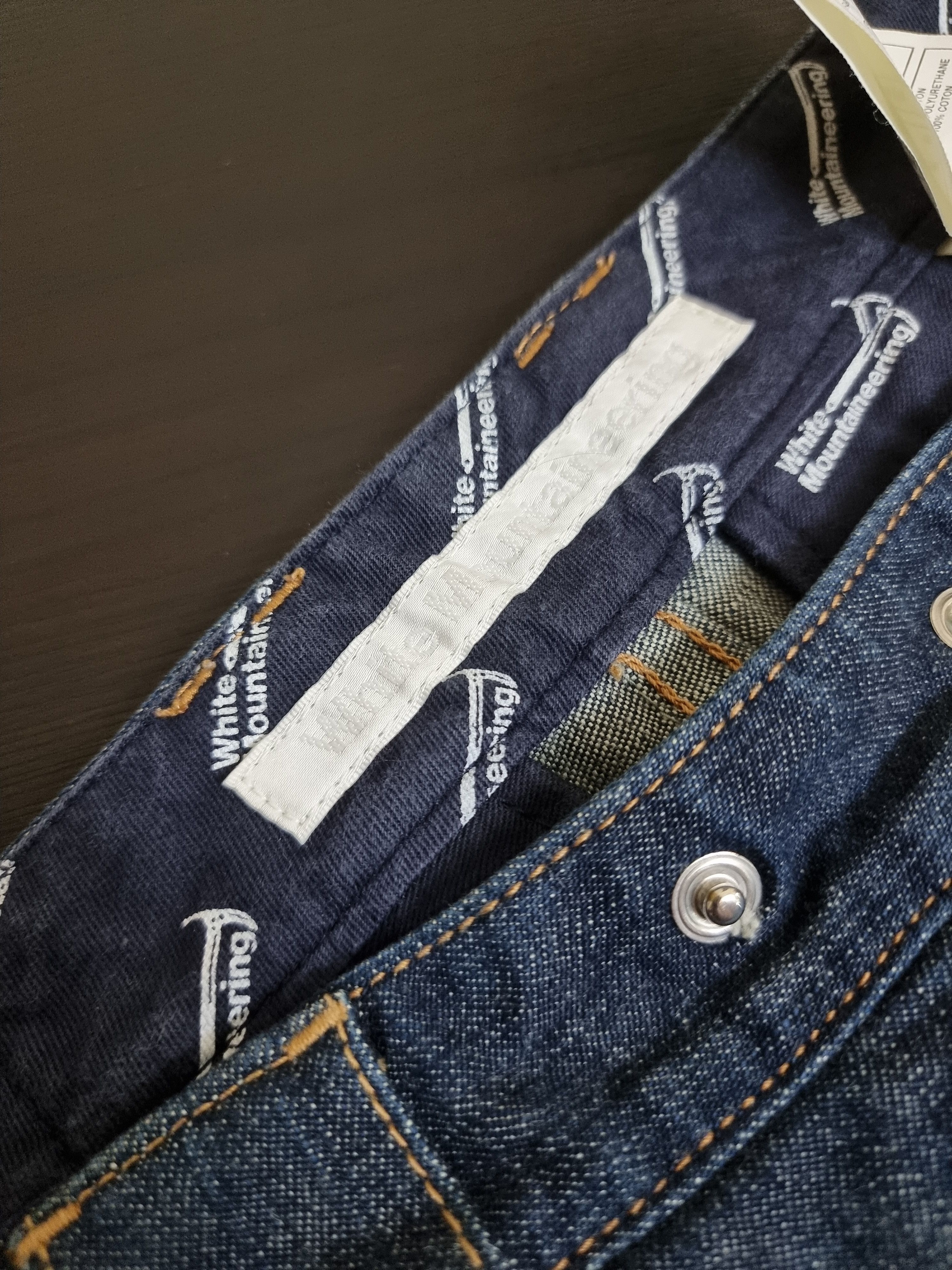 White Mountainering drop crotch denim pants