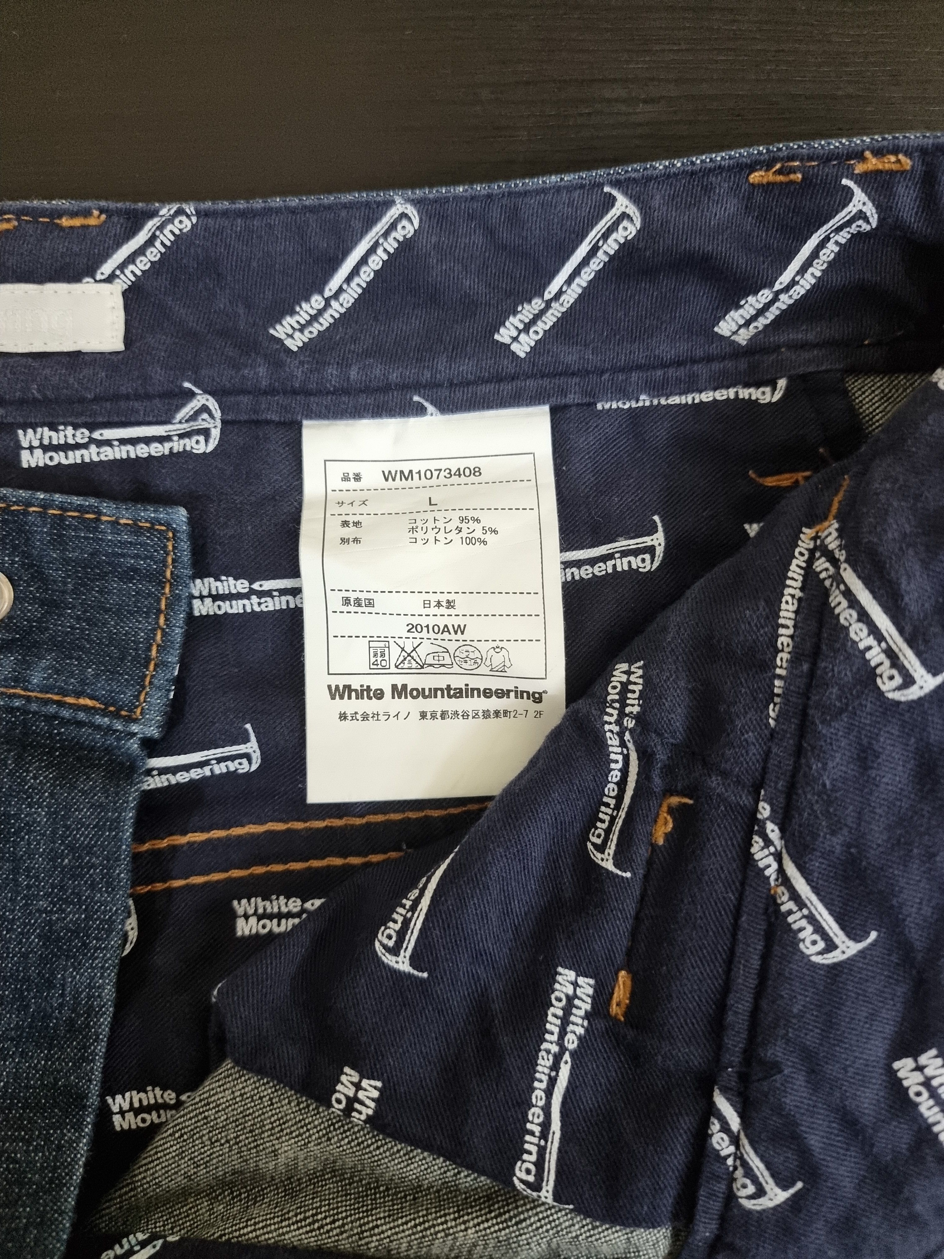 White Mountainering drop crotch denim pants
