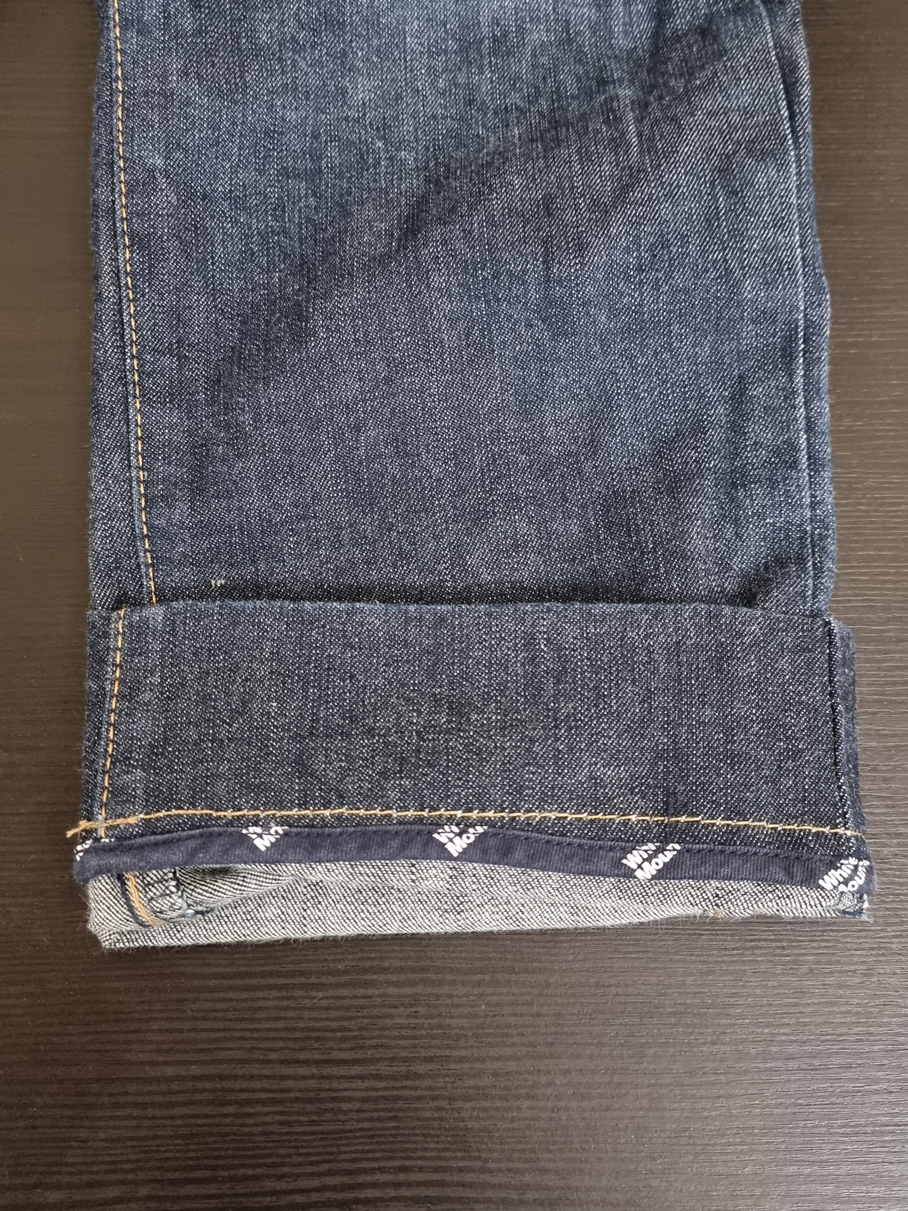White Mountainering drop crotch denim pants