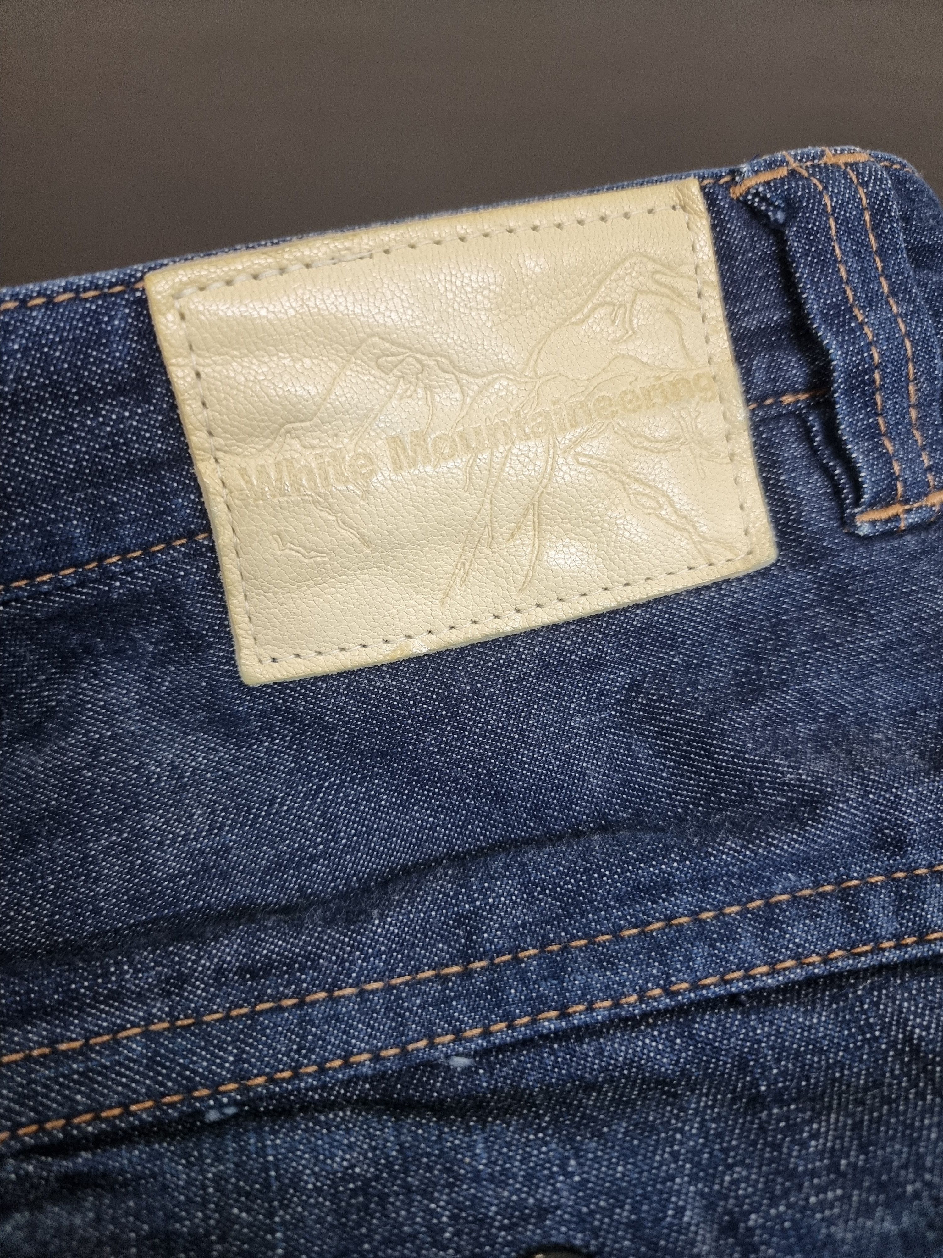 White Mountainering drop crotch denim pants