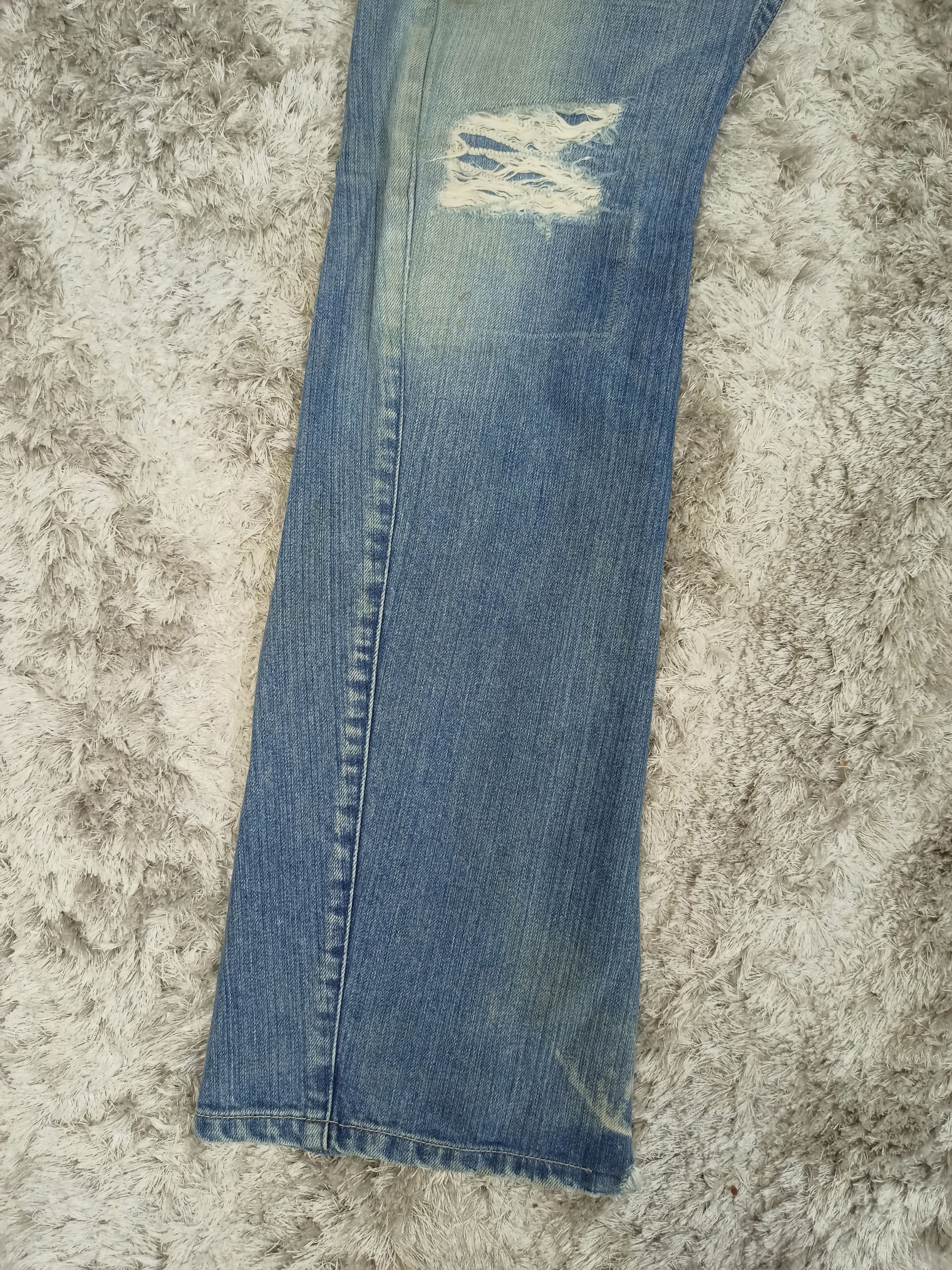 Vintage Rattle Trap Distressed Mudwash Flare Jeans
