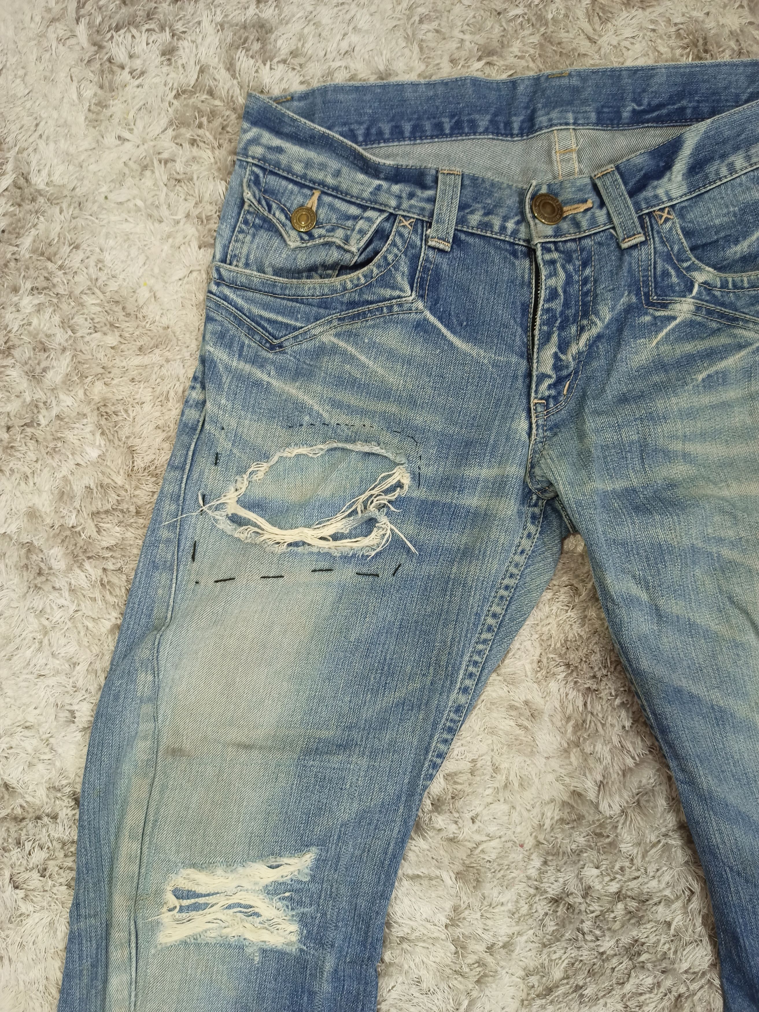 Vintage Rattle Trap Distressed Mudwash Flare Jeans